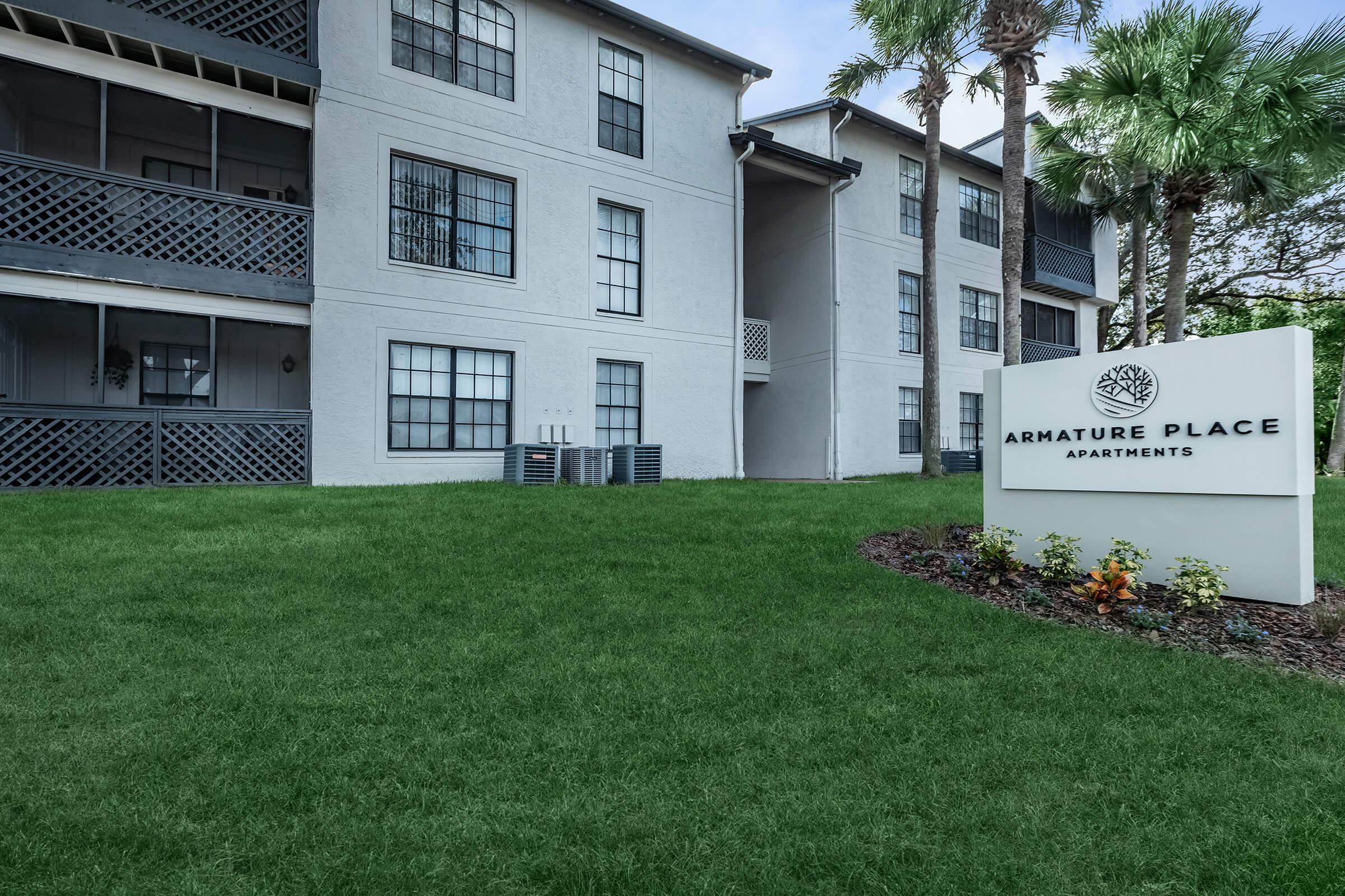 a large lawn in front of a house