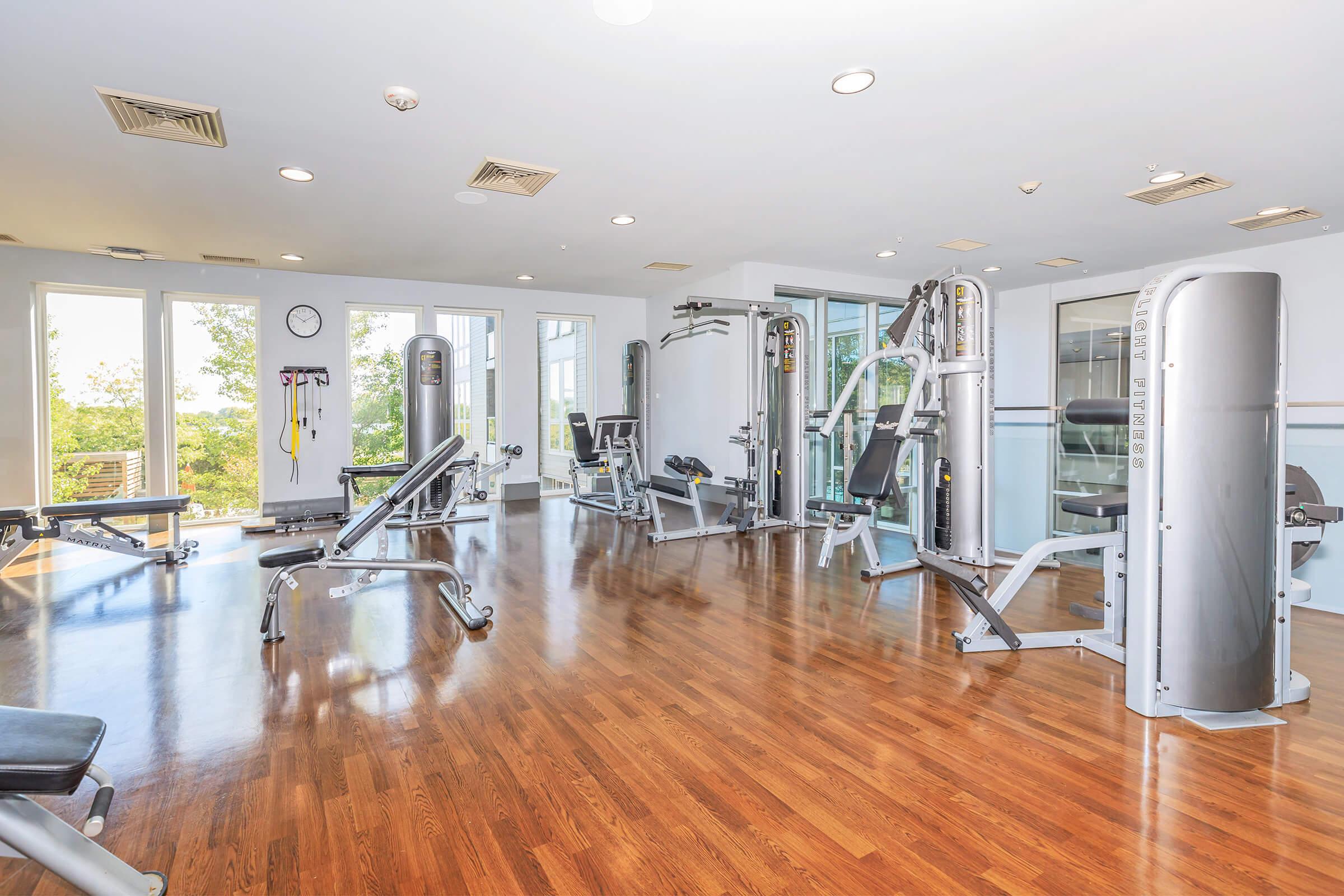 a room filled with furniture and a large window