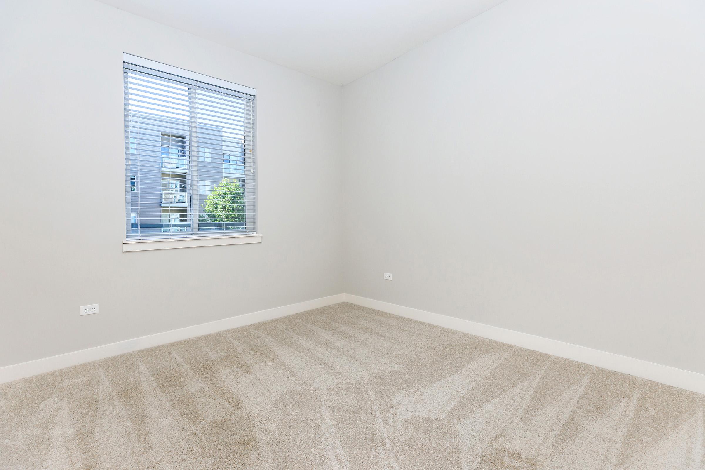 a room with a sink and a window