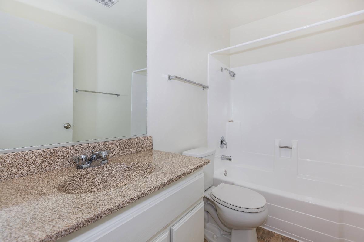 bathroom with granite countertops