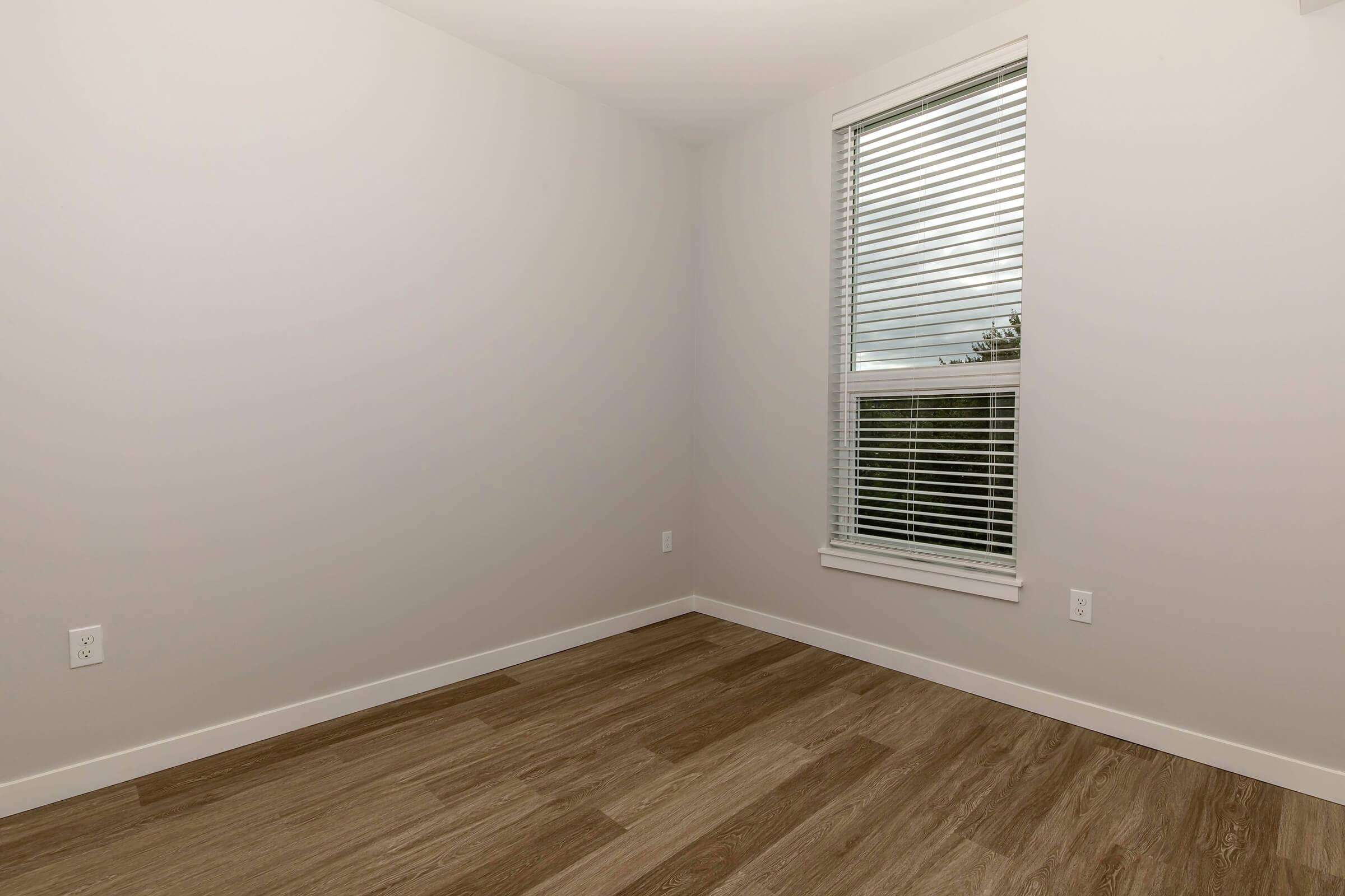 a room with a sink and a window