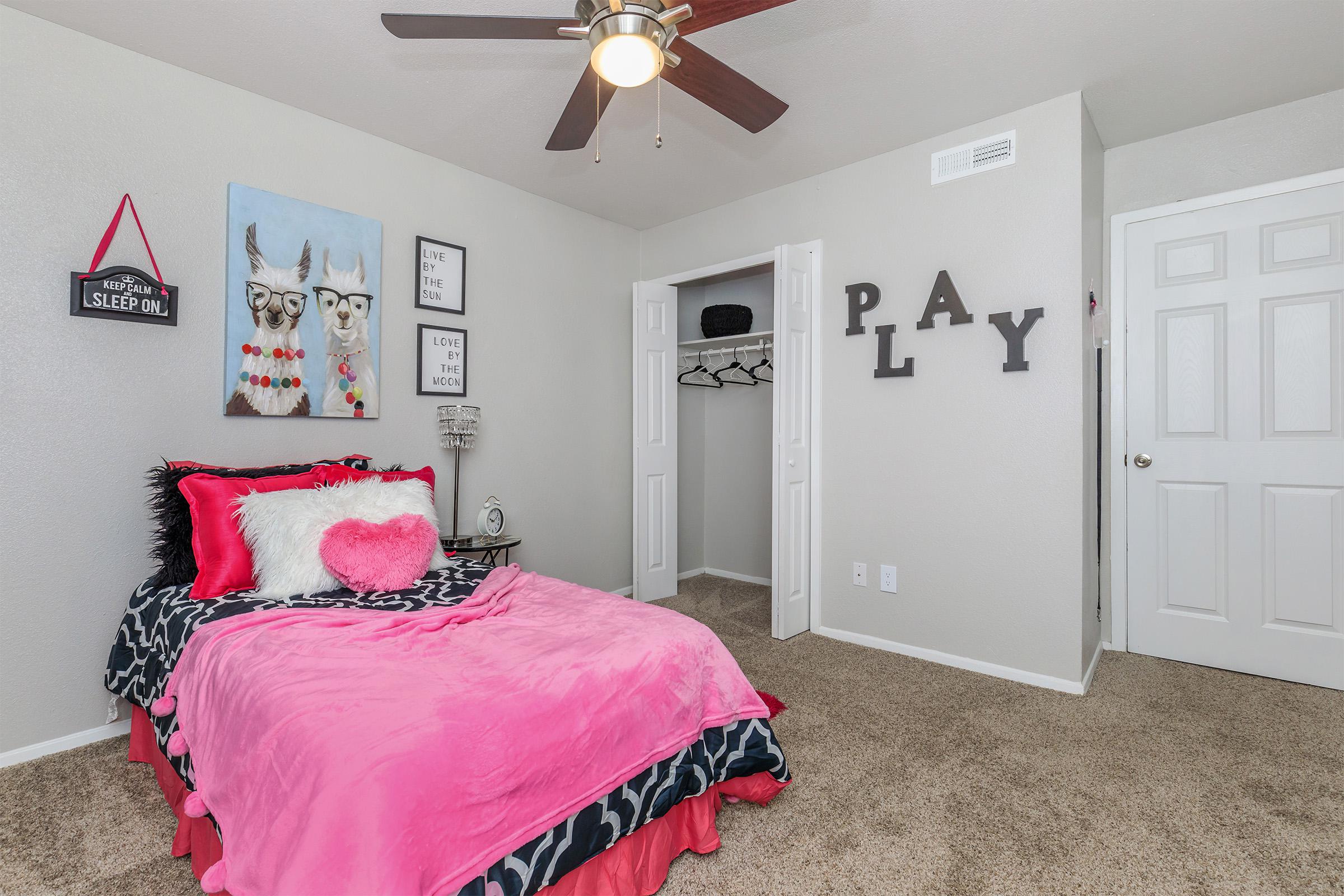 a bedroom with a bed and painted red