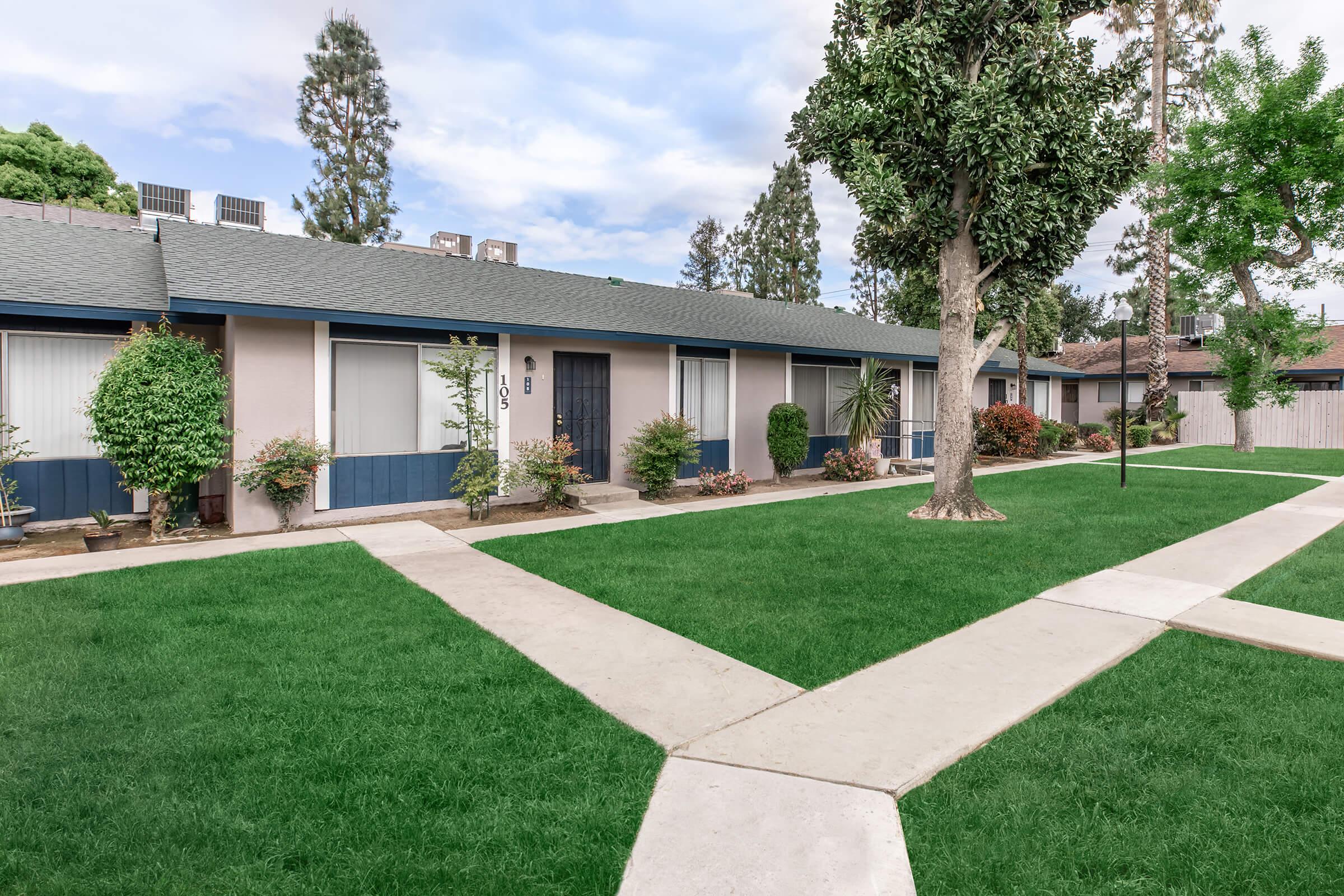 a large lawn in front of a house