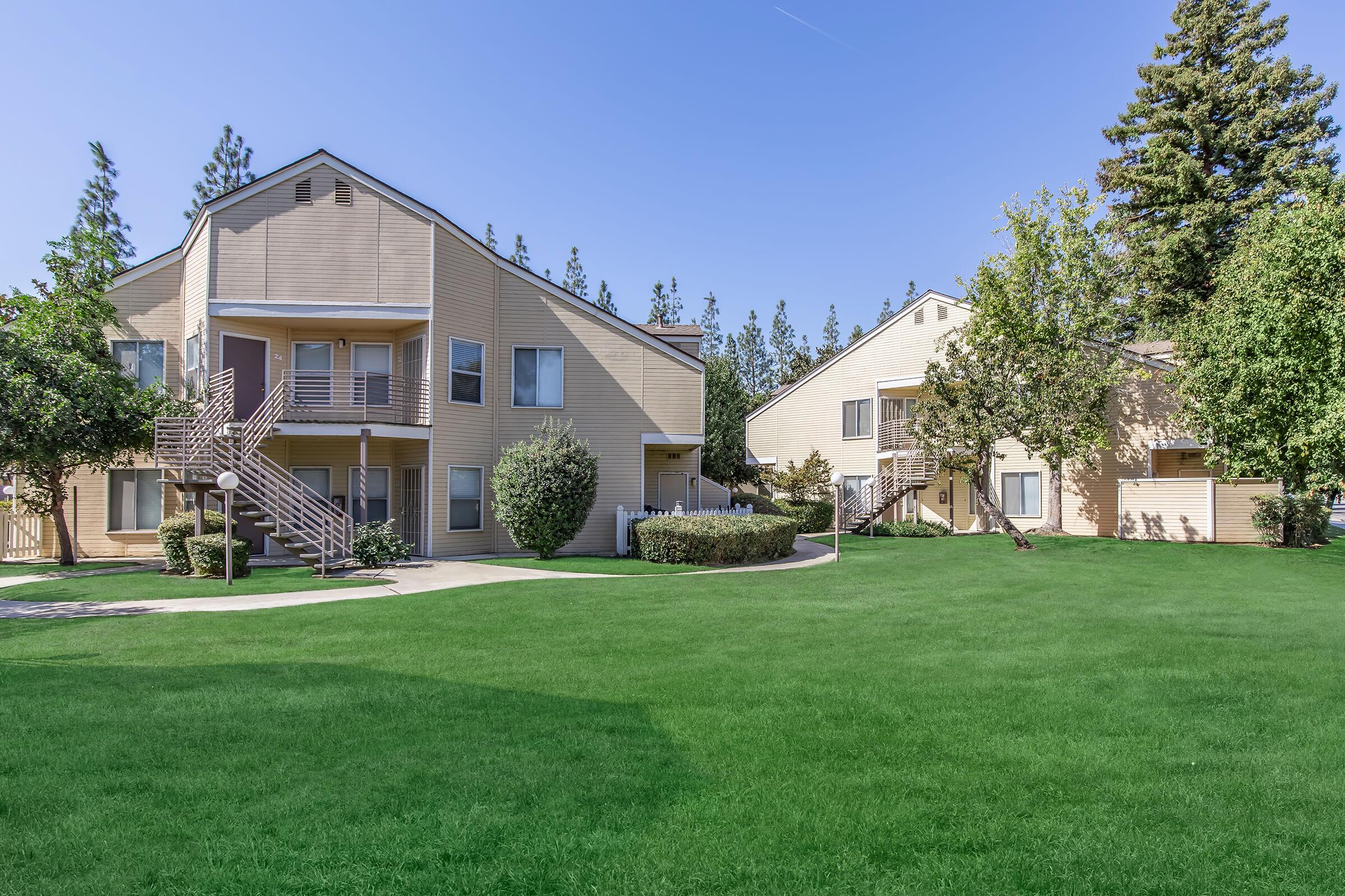 a large lawn in front of a house