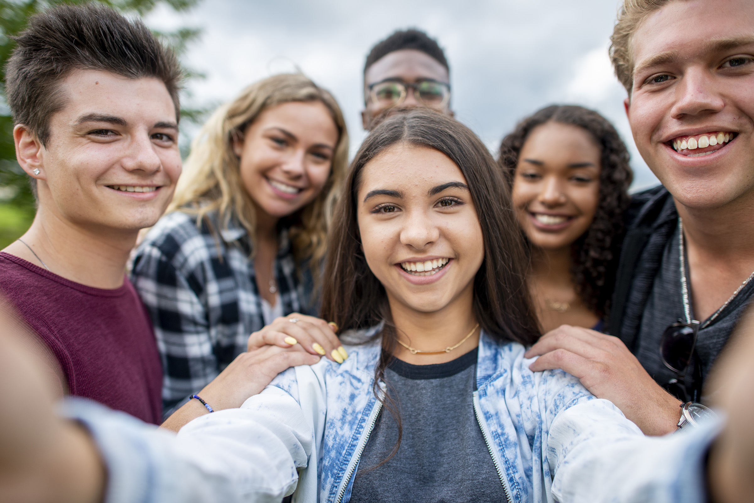 a group of people posing for the camera