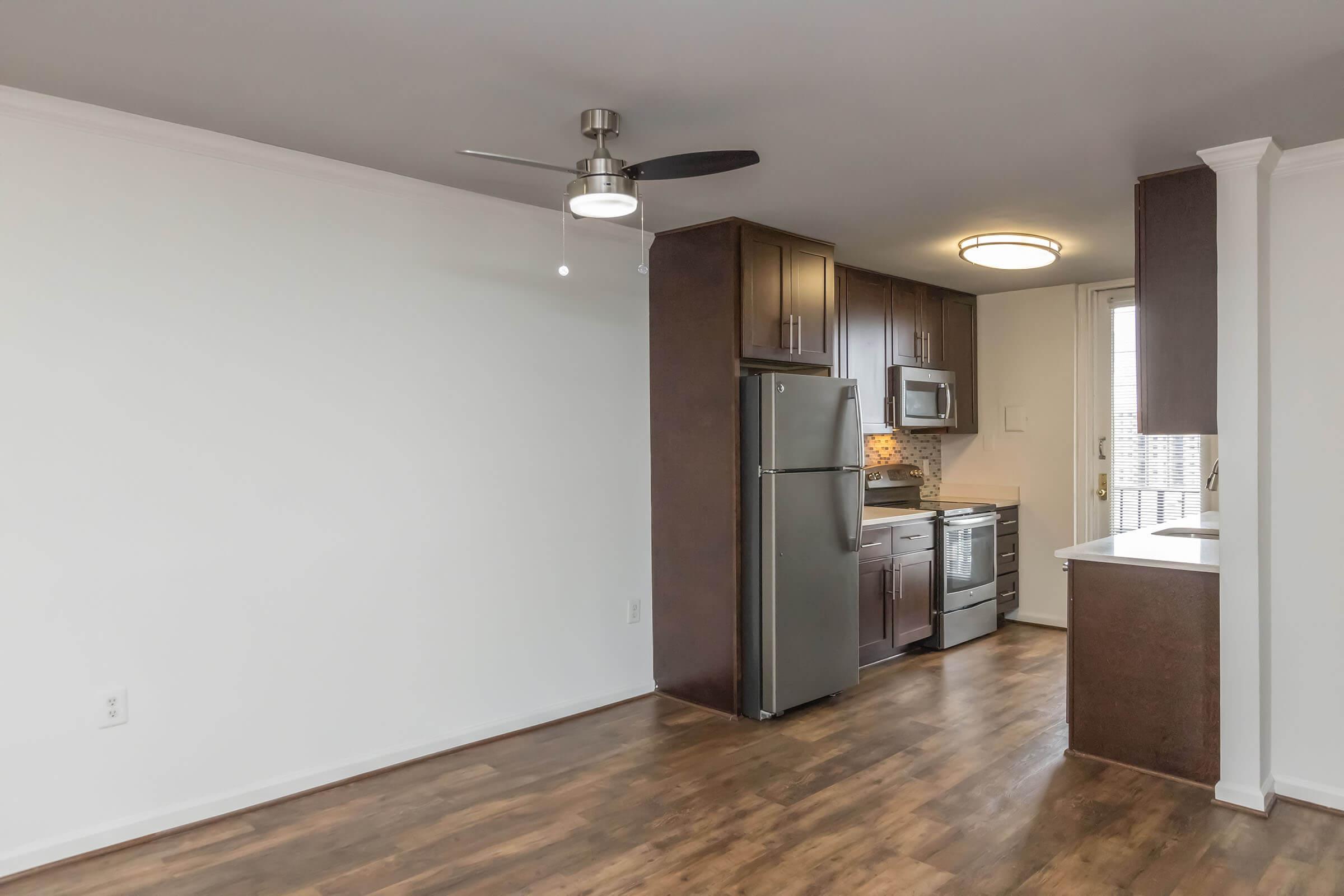 a stainless steel refrigerator in a room