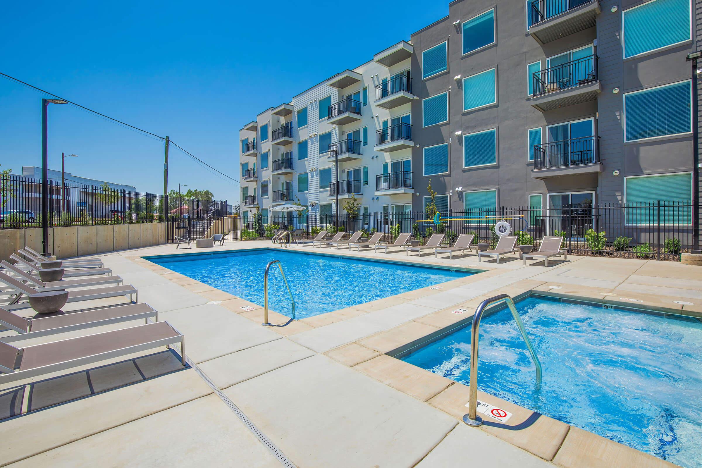 a pool next to a building