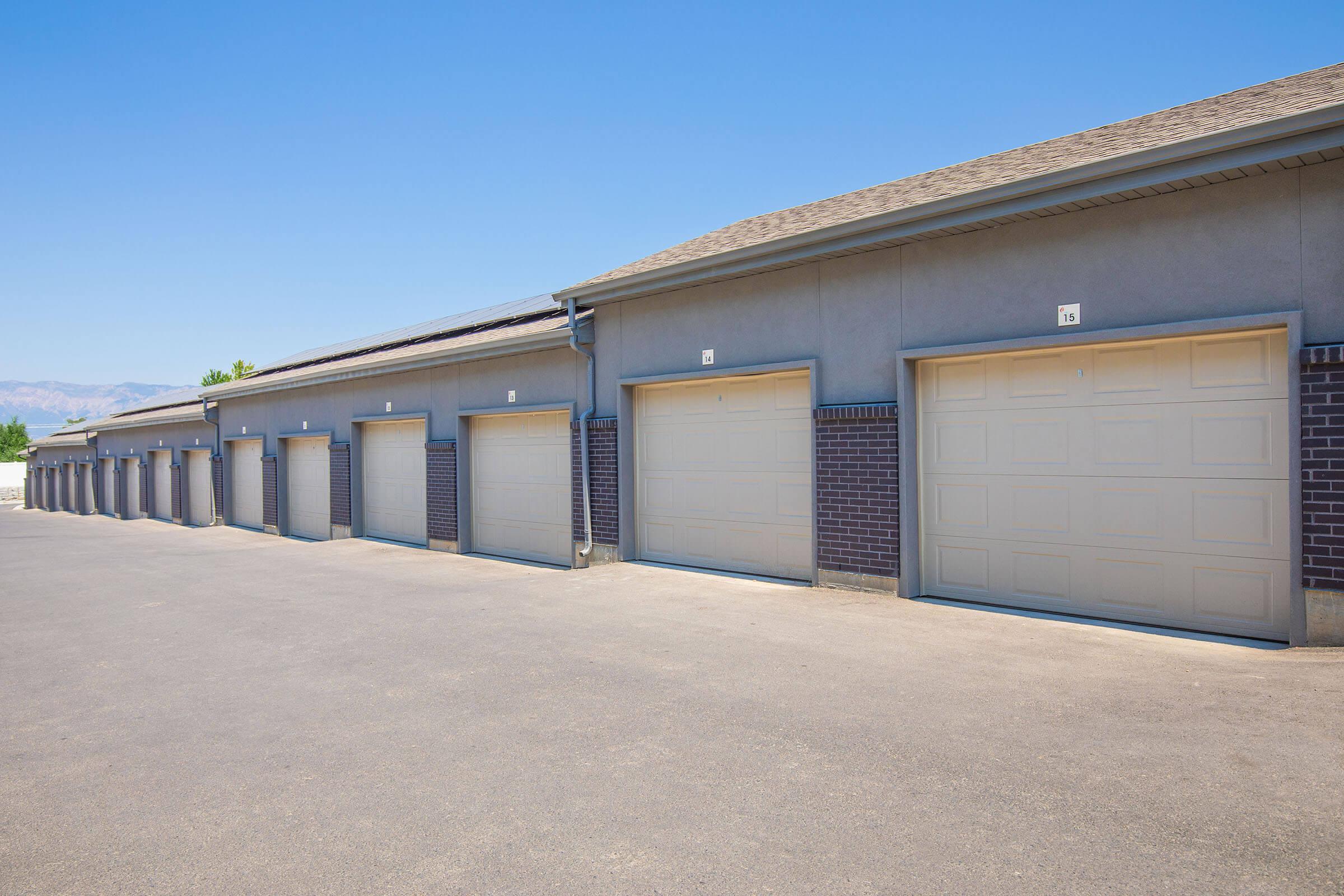 an empty parking lot in front of a building