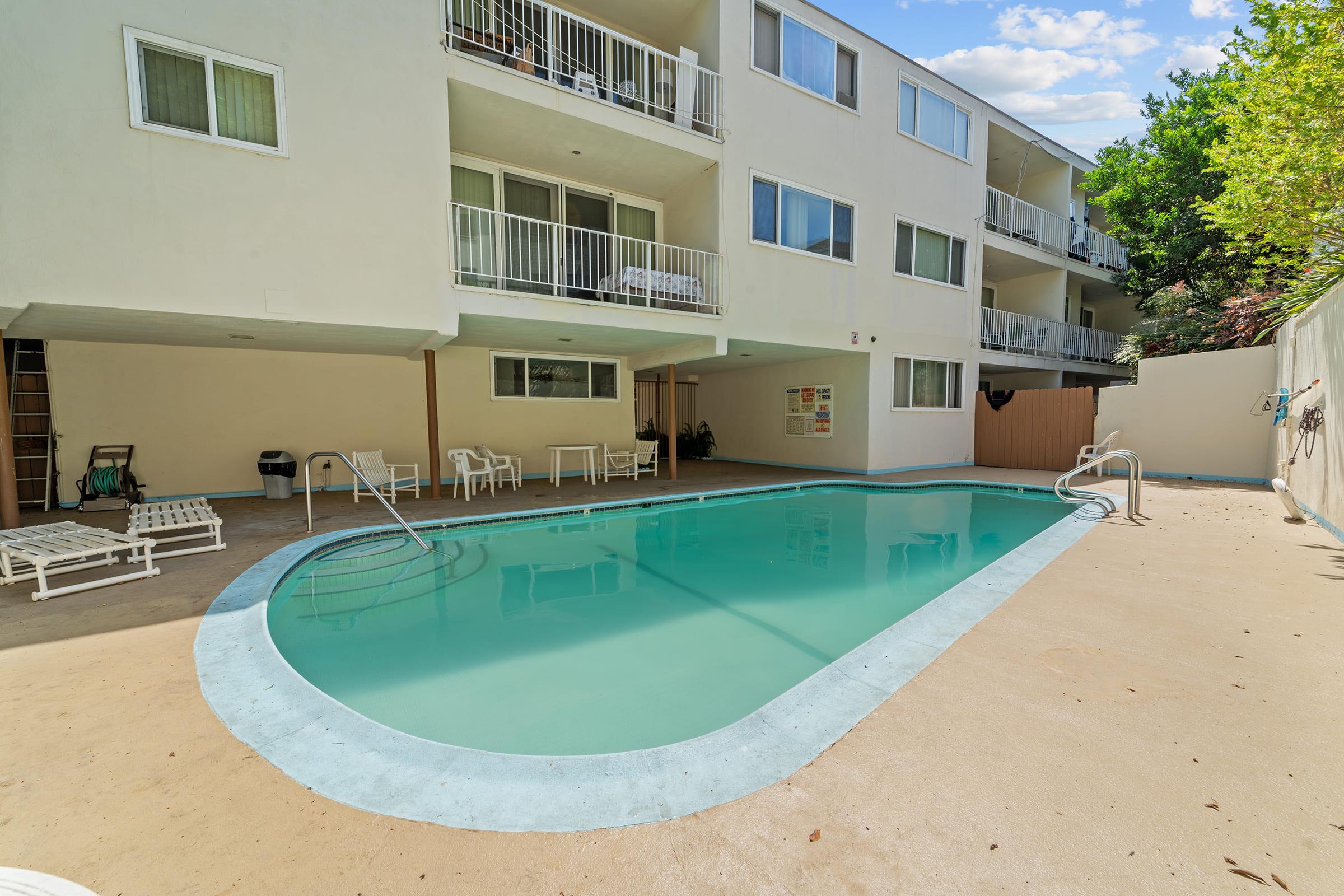 a pool next to a building