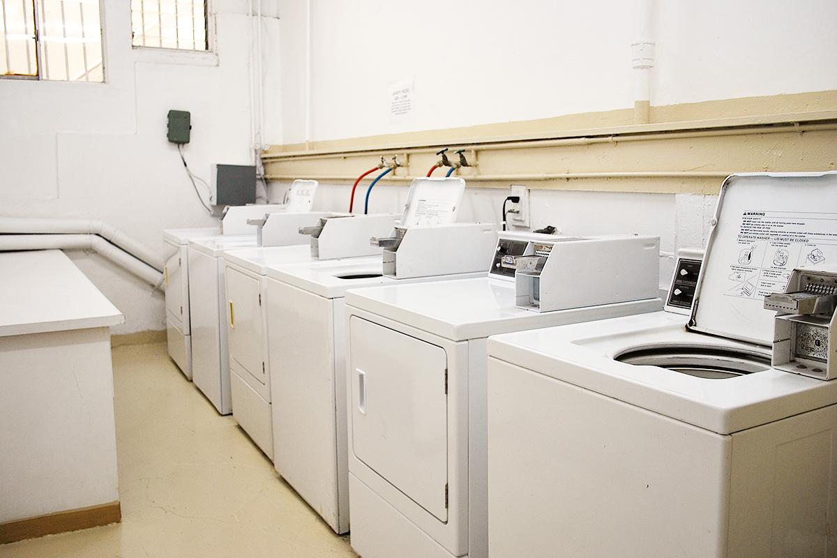 a white refrigerator freezer sitting inside of a kitchen