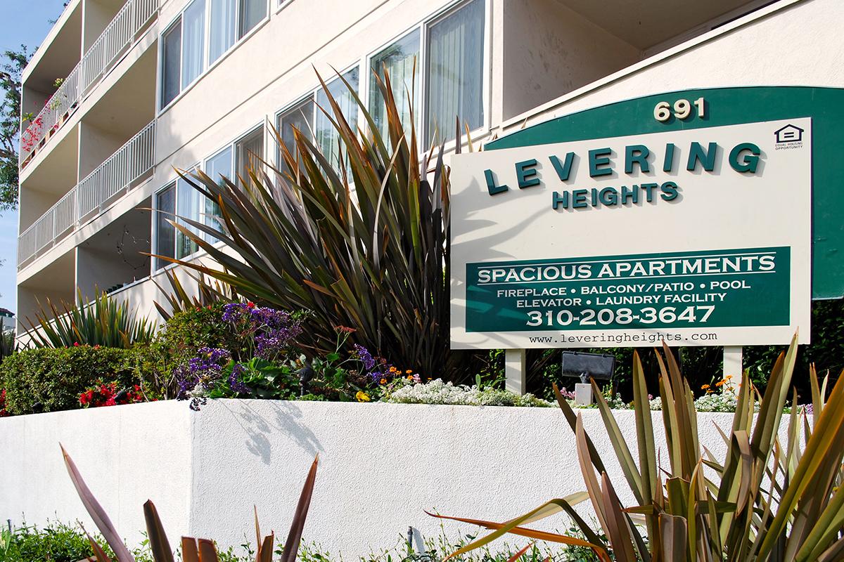 a sign in front of a building