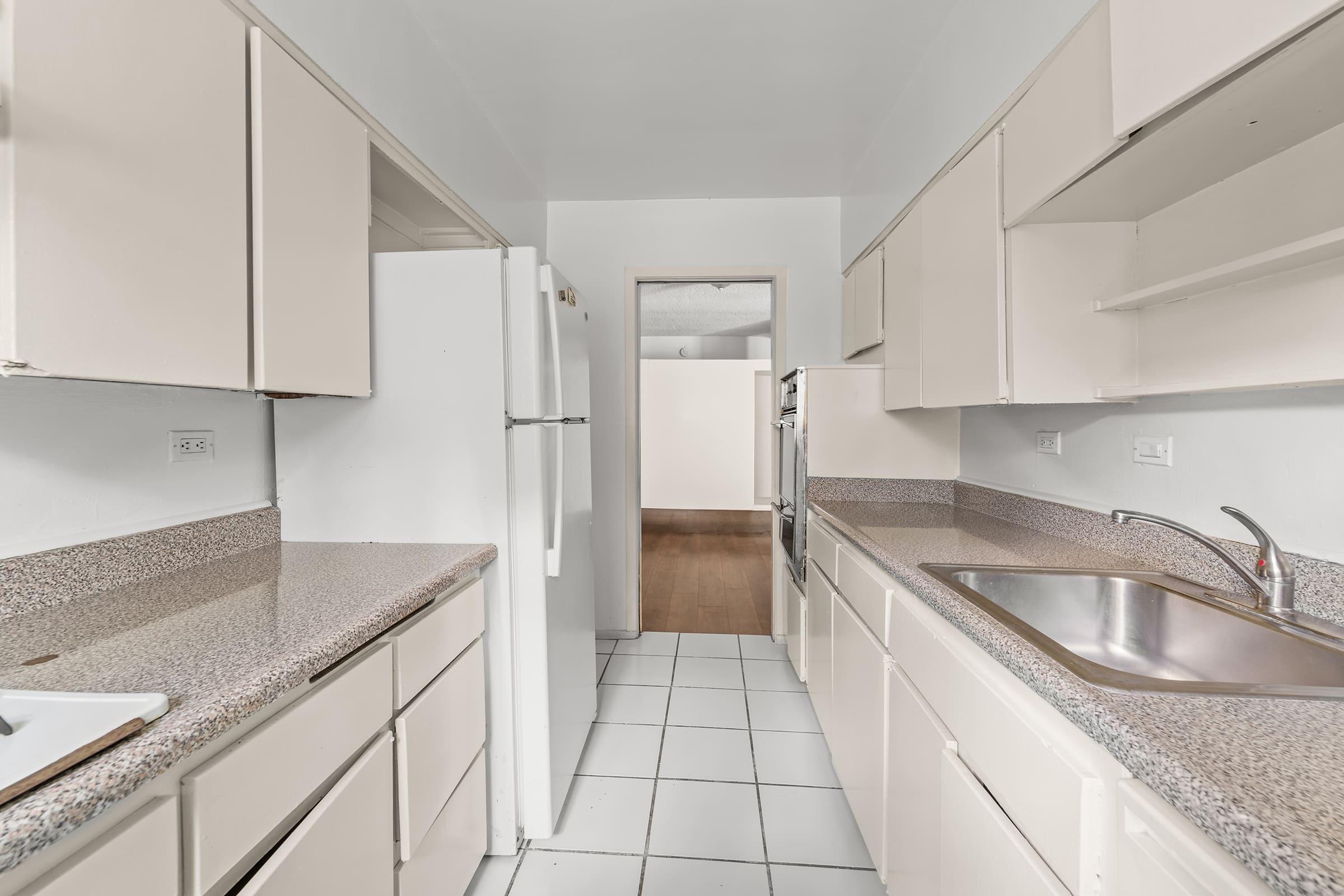 a stainless steel refrigerator in a kitchen