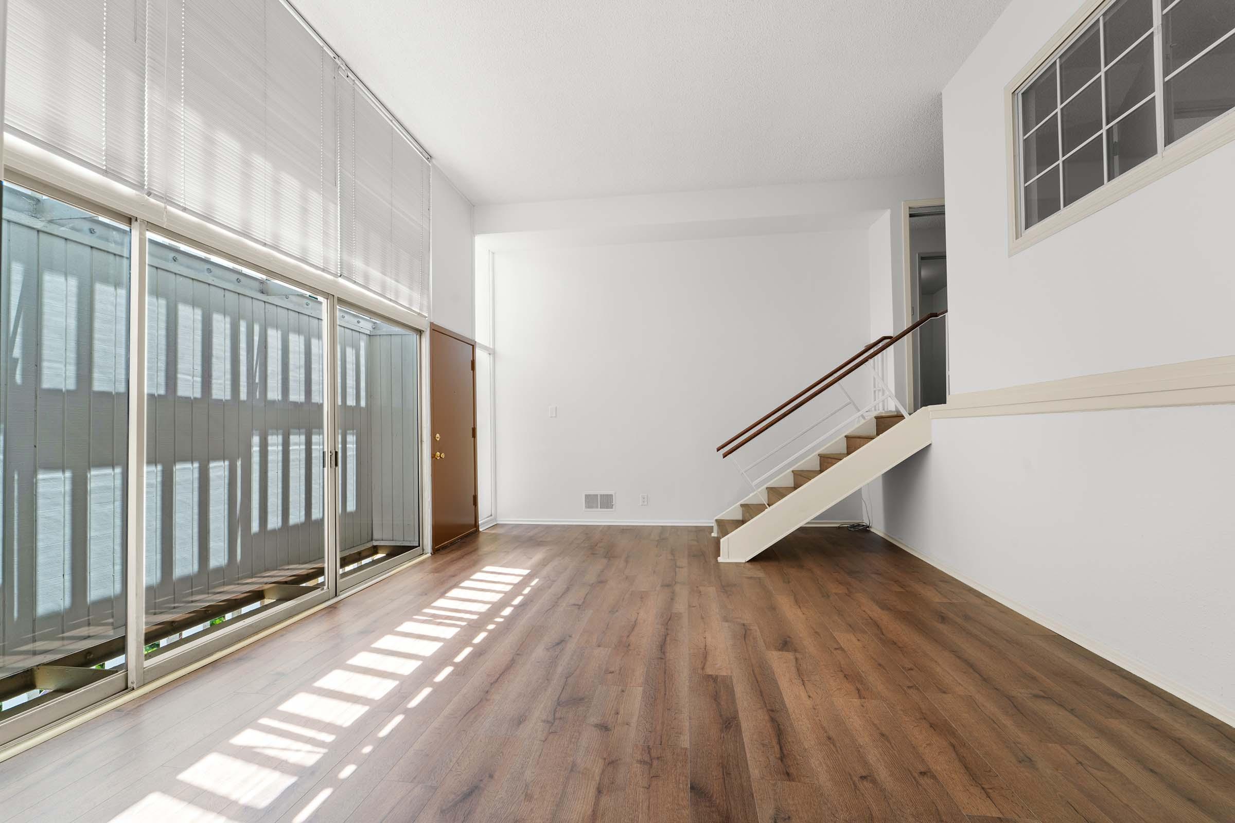 a bedroom with a large window