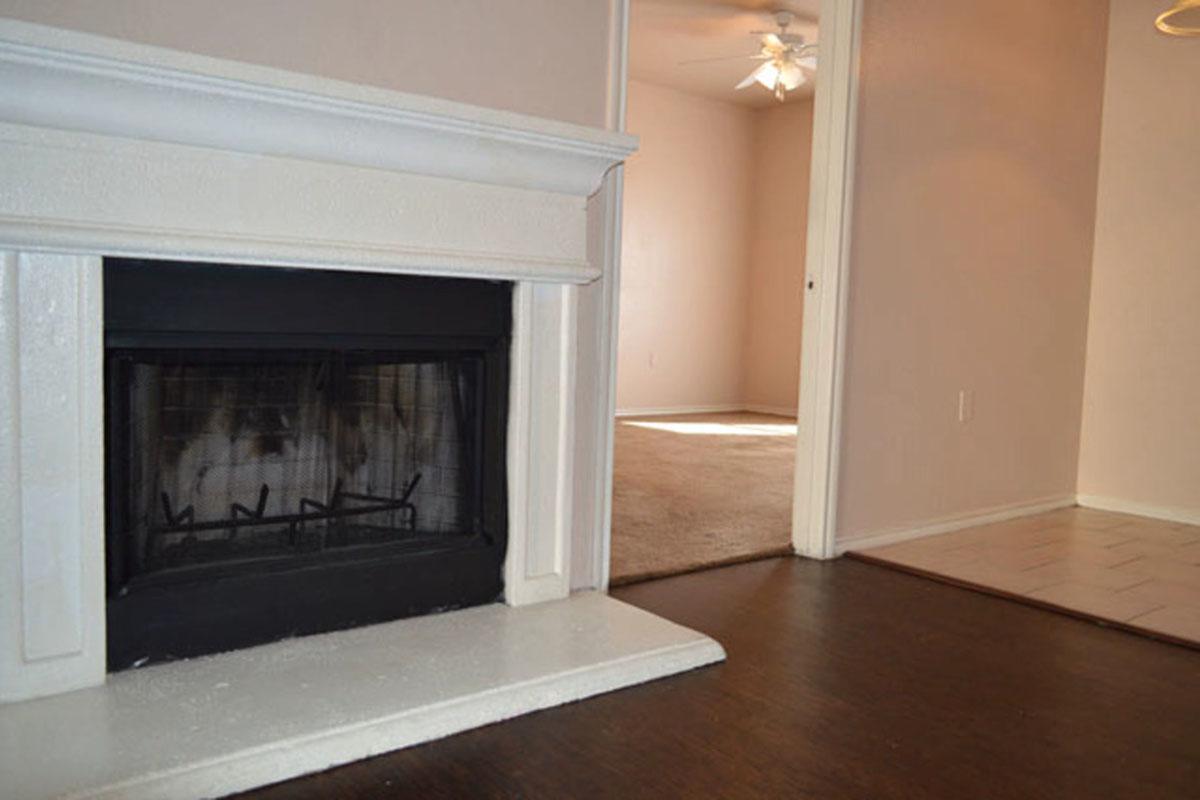 a stove top oven sitting next to a fireplace