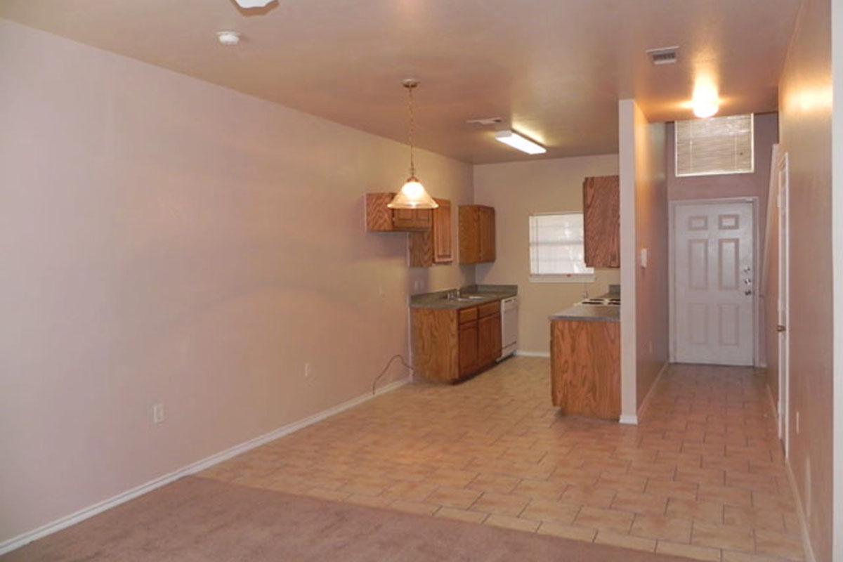 a kitchen with a wood floor