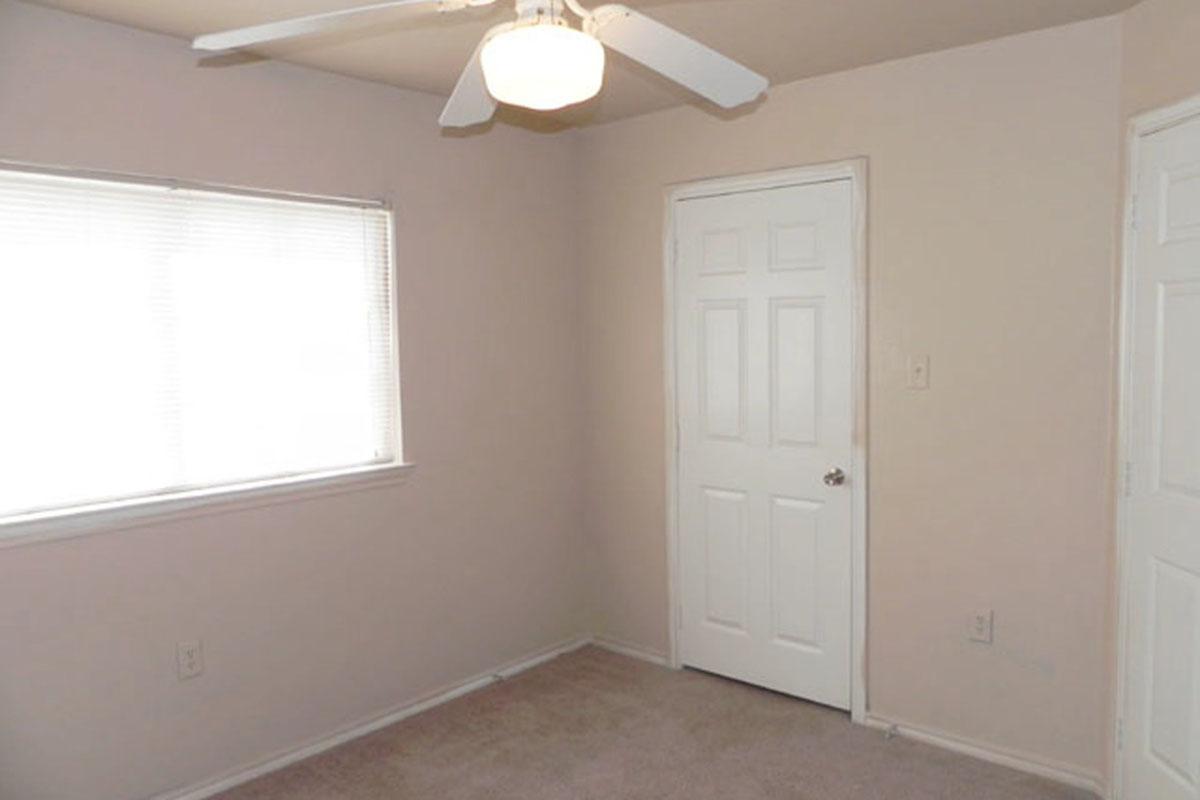 a room with a sink and a window