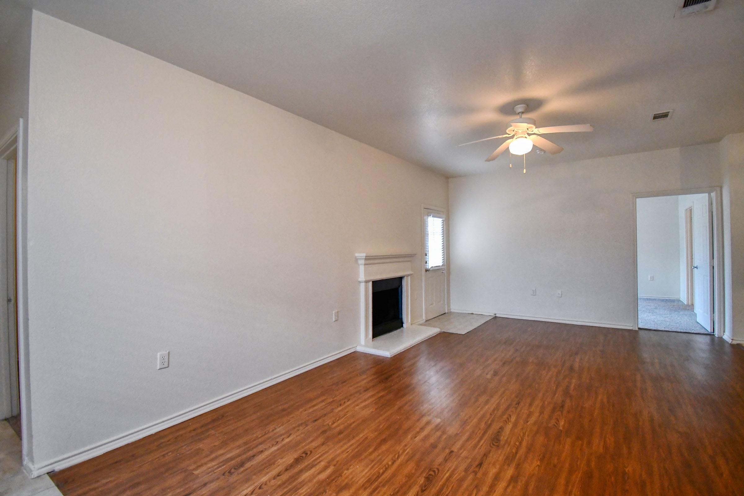 a room with a hard wood floor