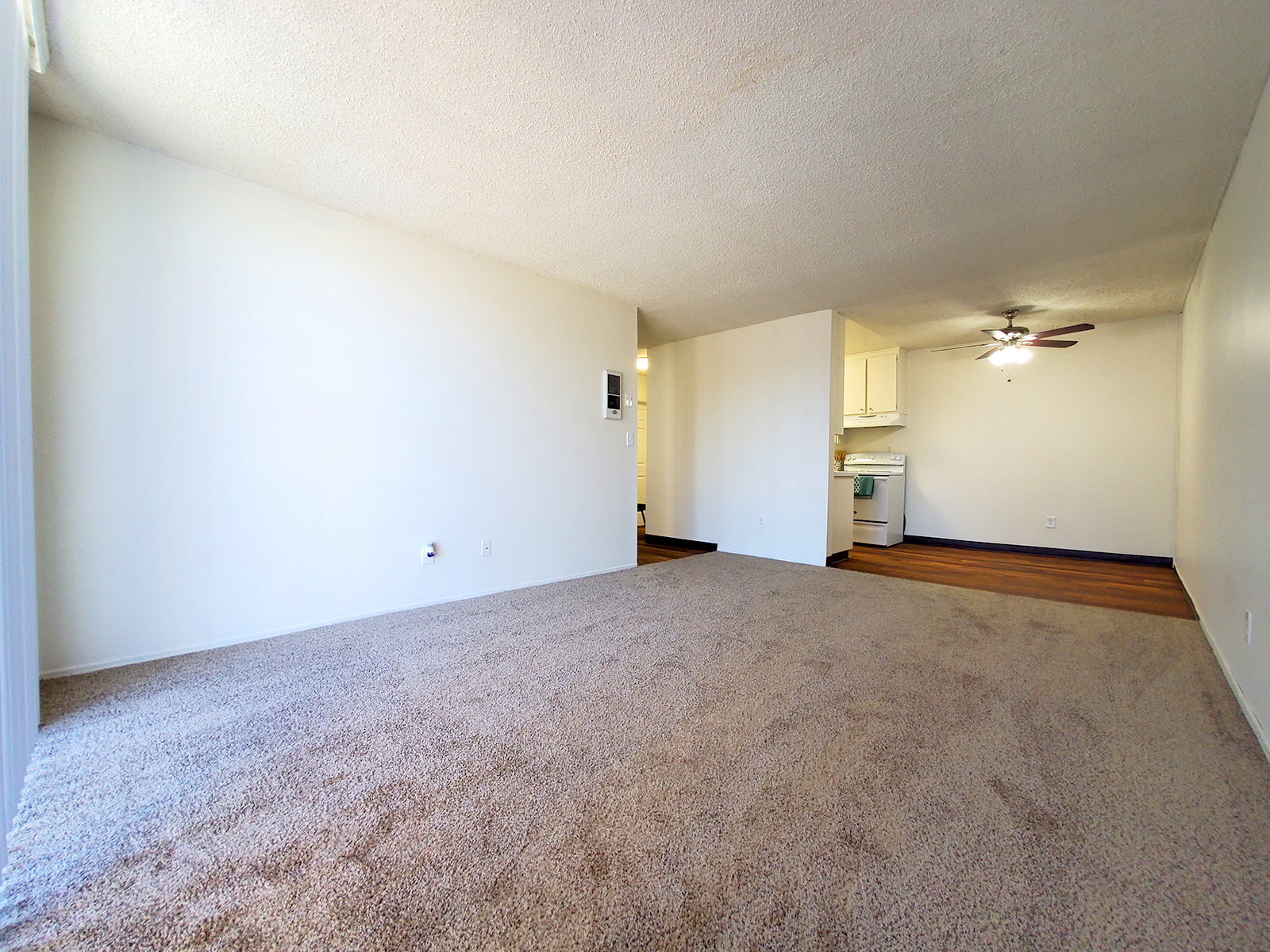a bedroom with a bed in a room