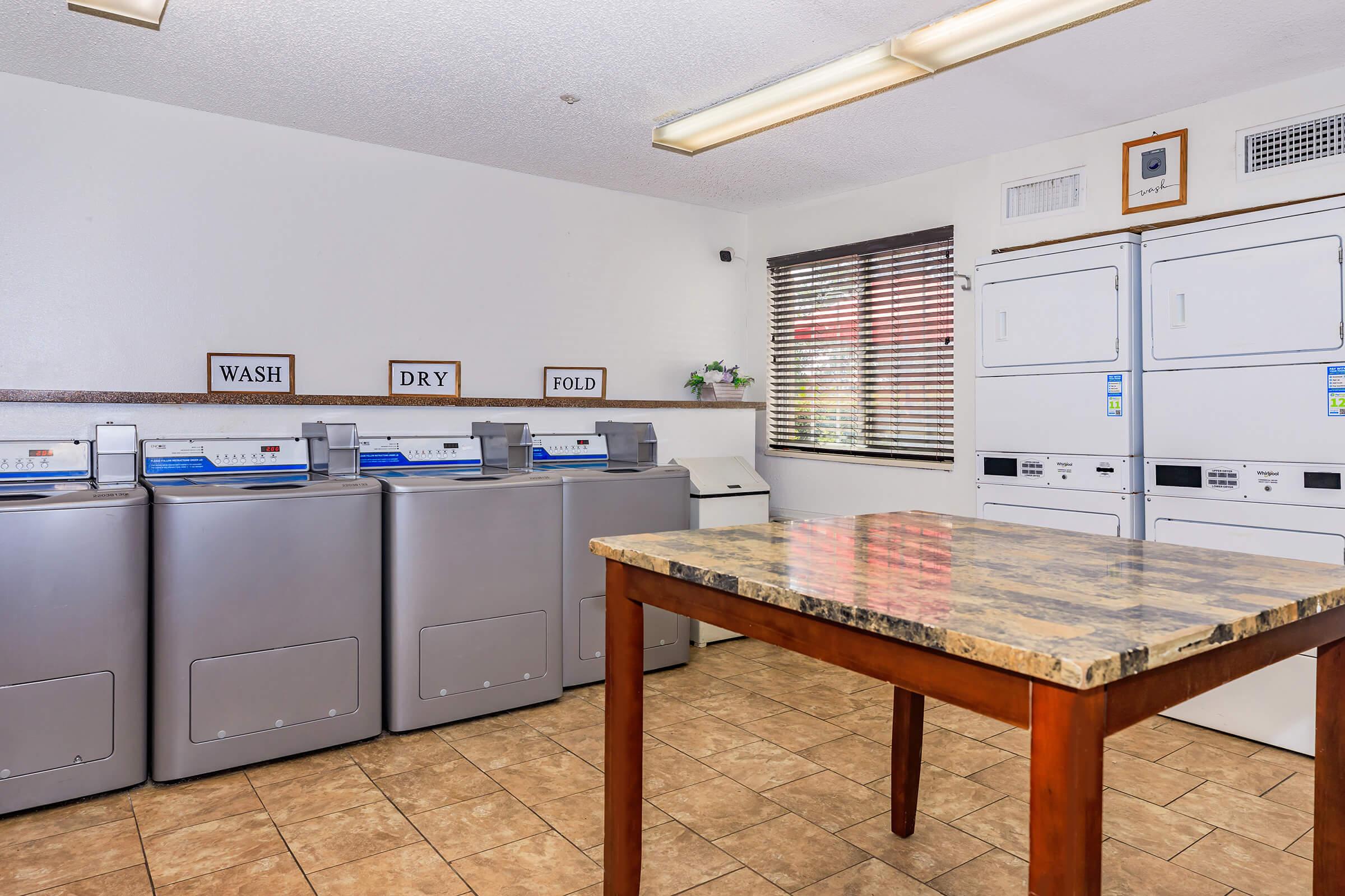 a kitchen with a table in a room