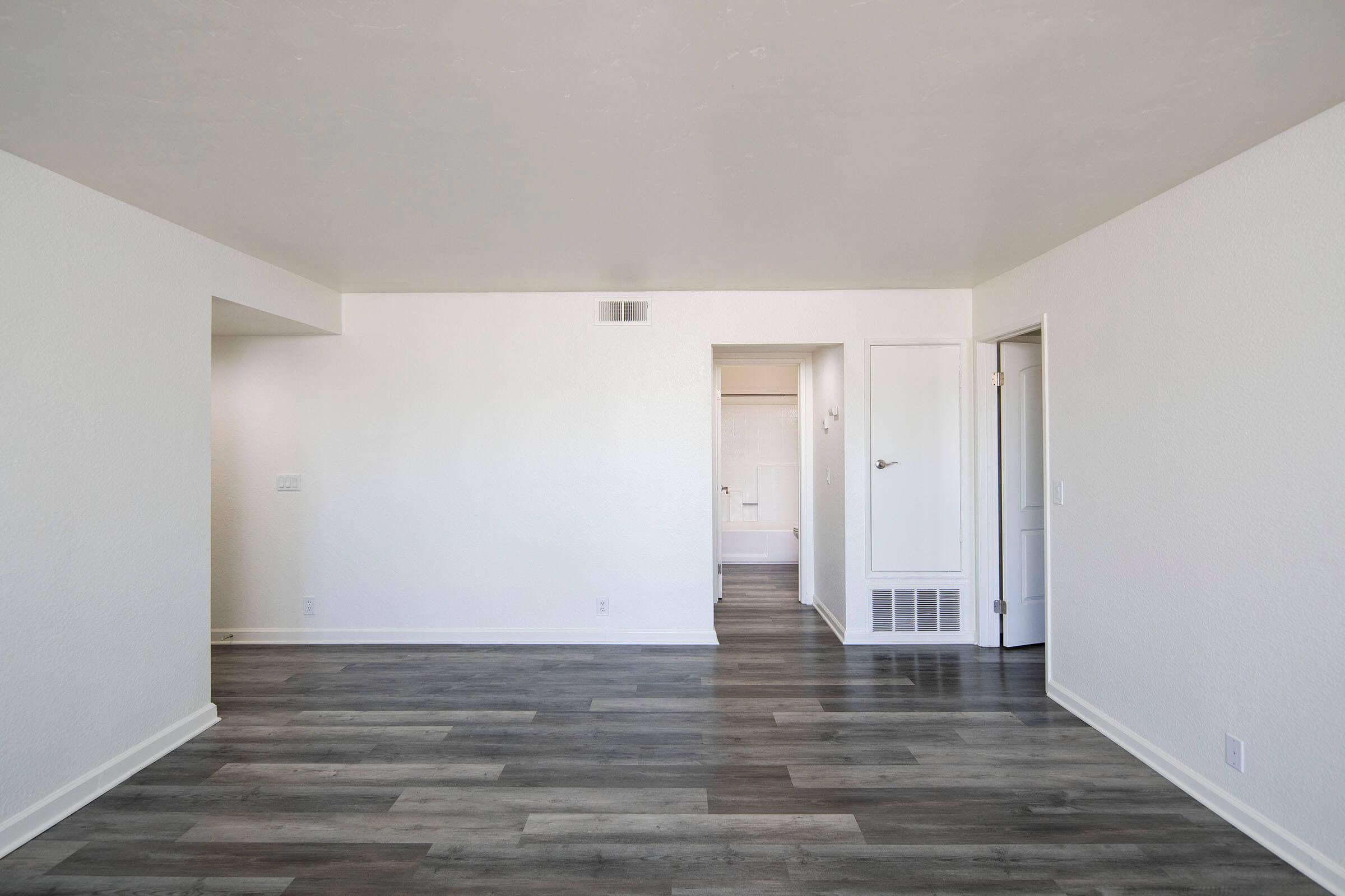 a kitchen with a wooden floor