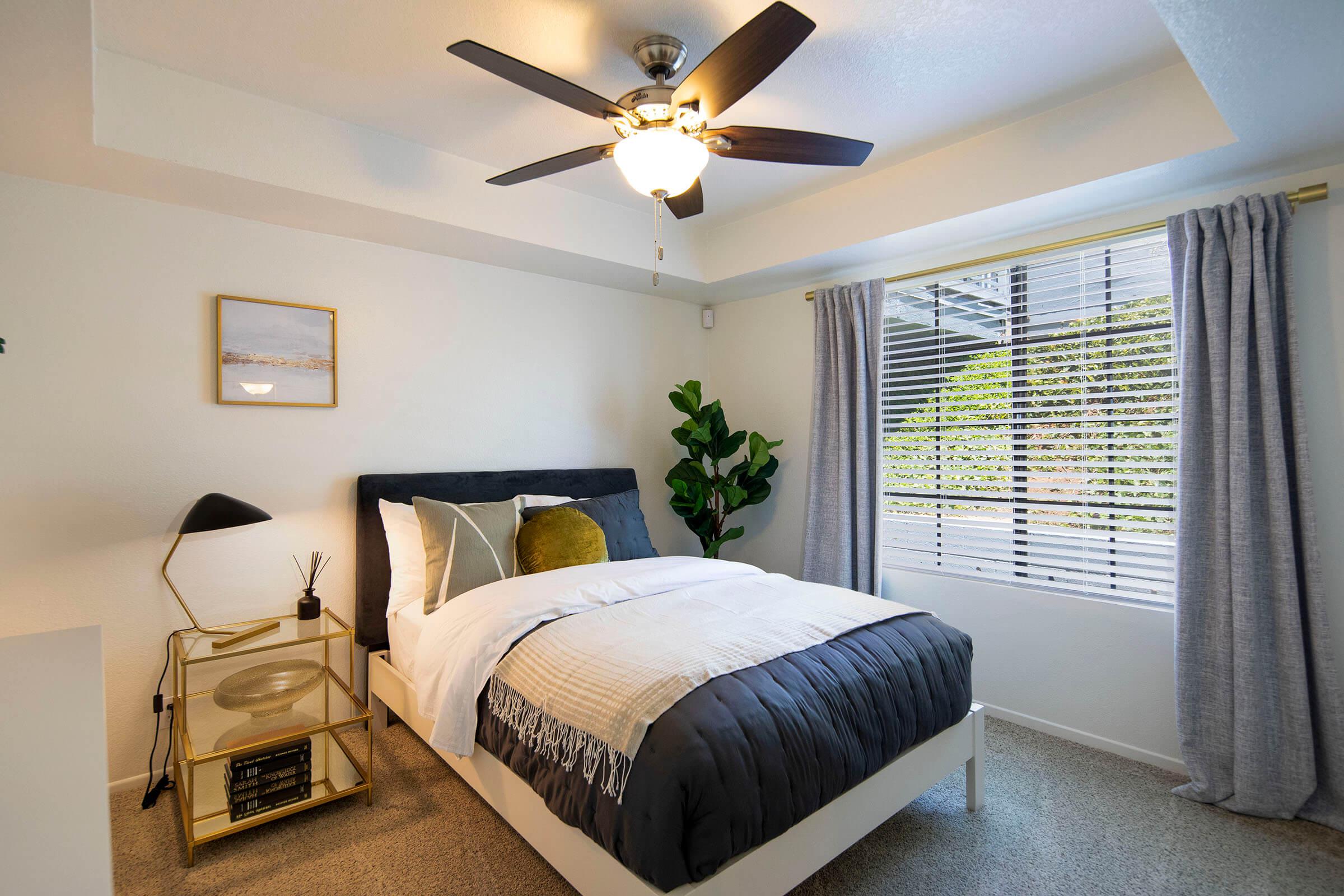 a bedroom with a bed in a hotel room