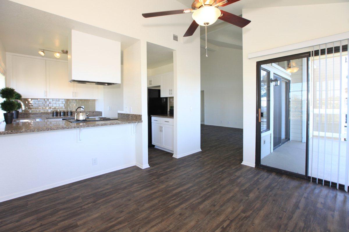 a kitchen with a wood floor