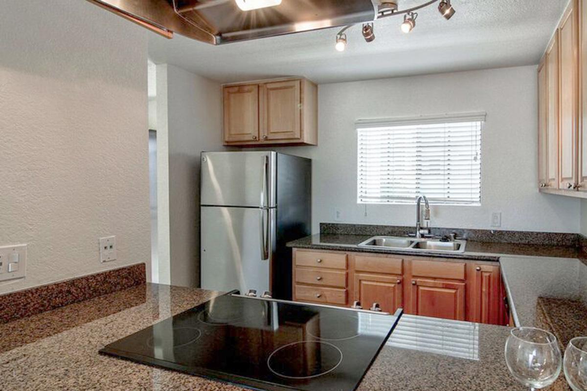 a kitchen with a sink and a window