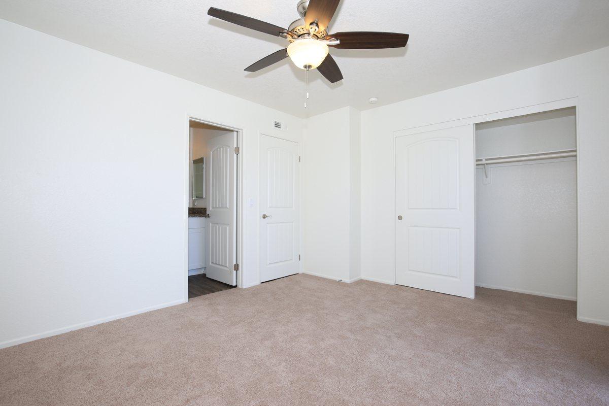 a large white refrigerator in a small room