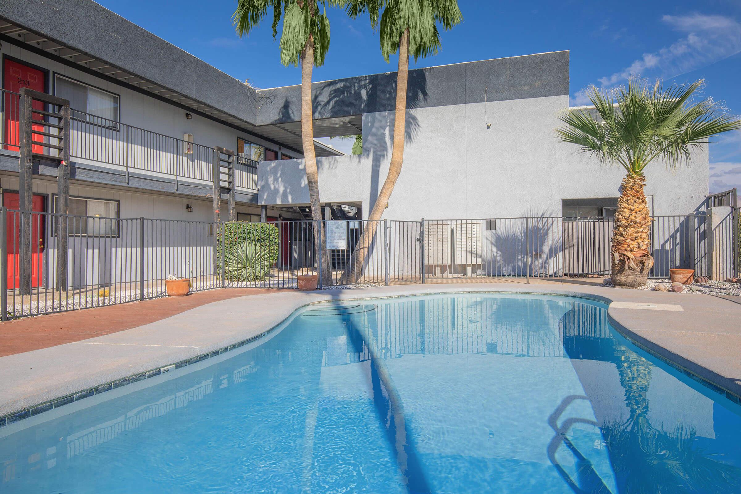 a pool next to a building