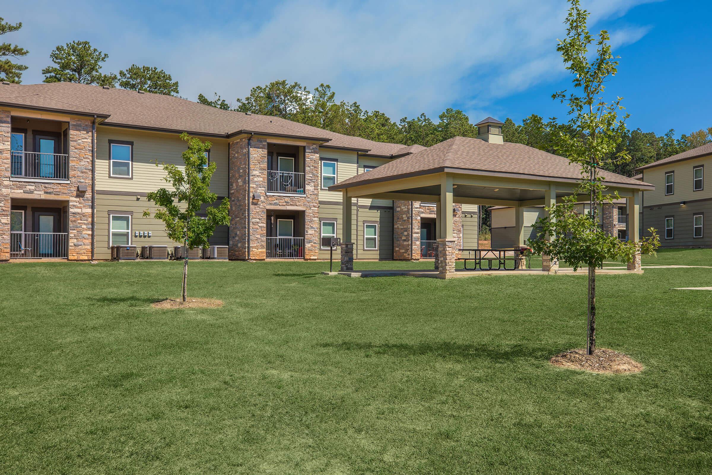 a large lawn in front of a house