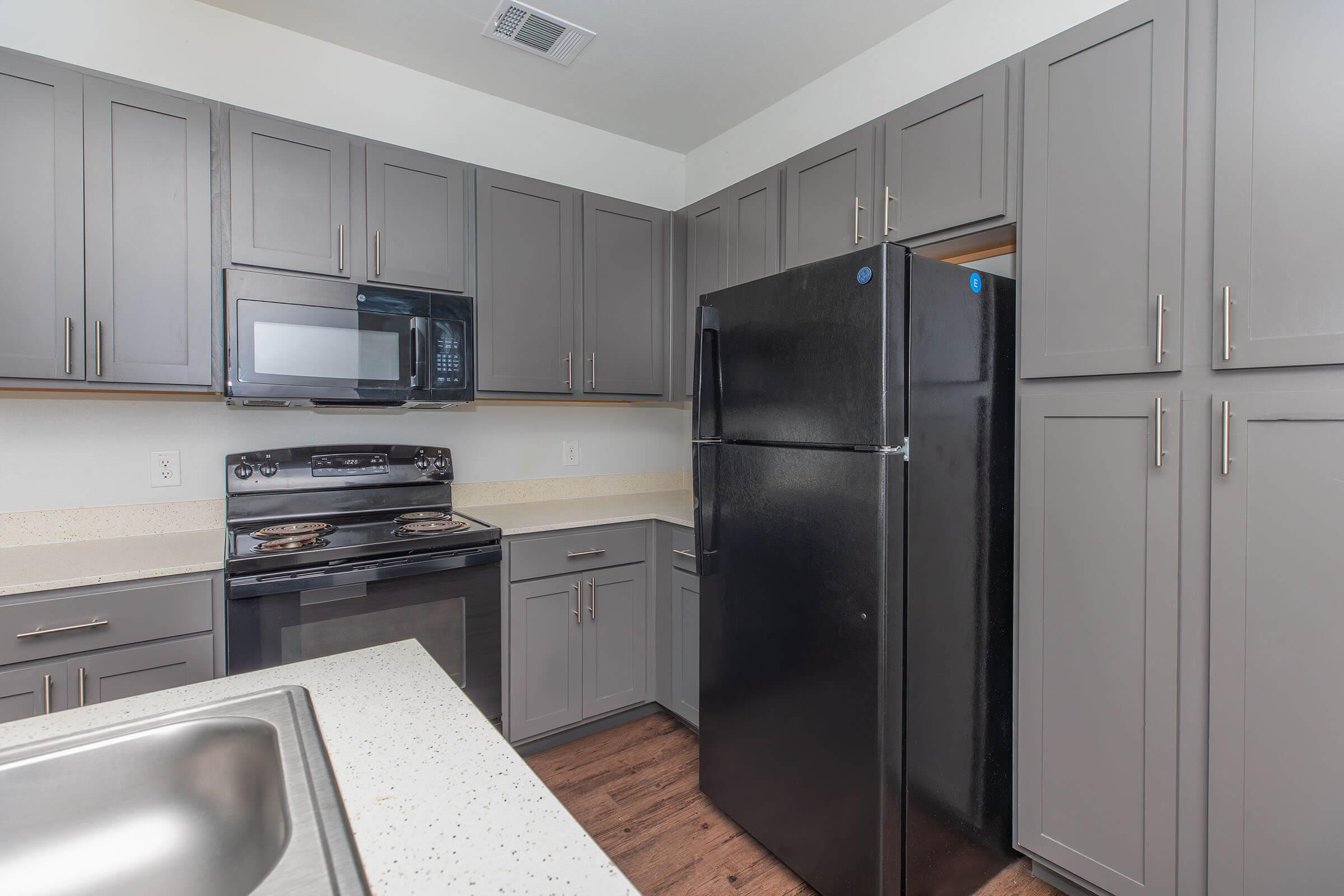 a stainless steel refrigerator in a kitchen