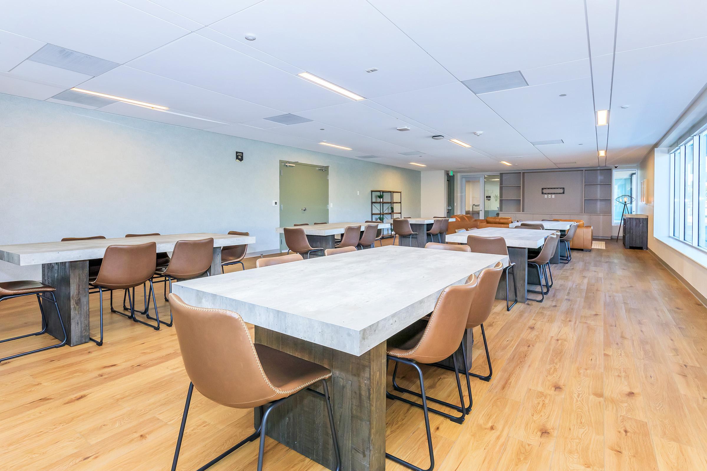 a room with a table and chairs