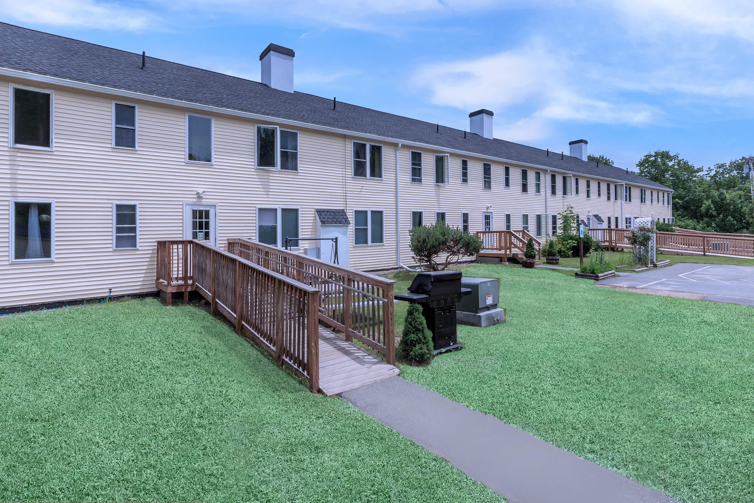 a large lawn in front of a house