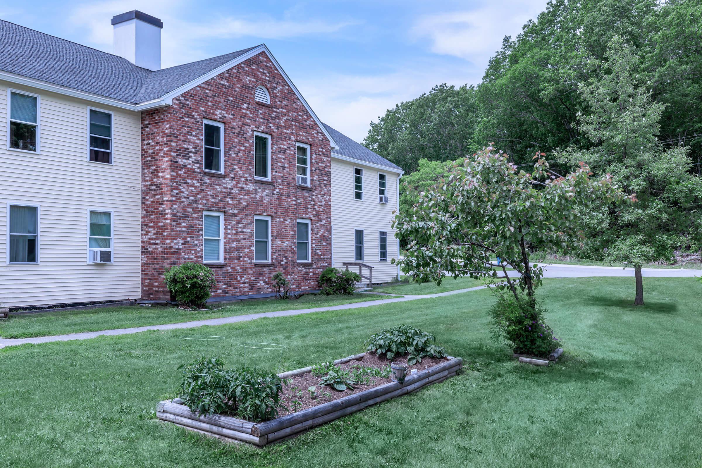 a large lawn in front of a house