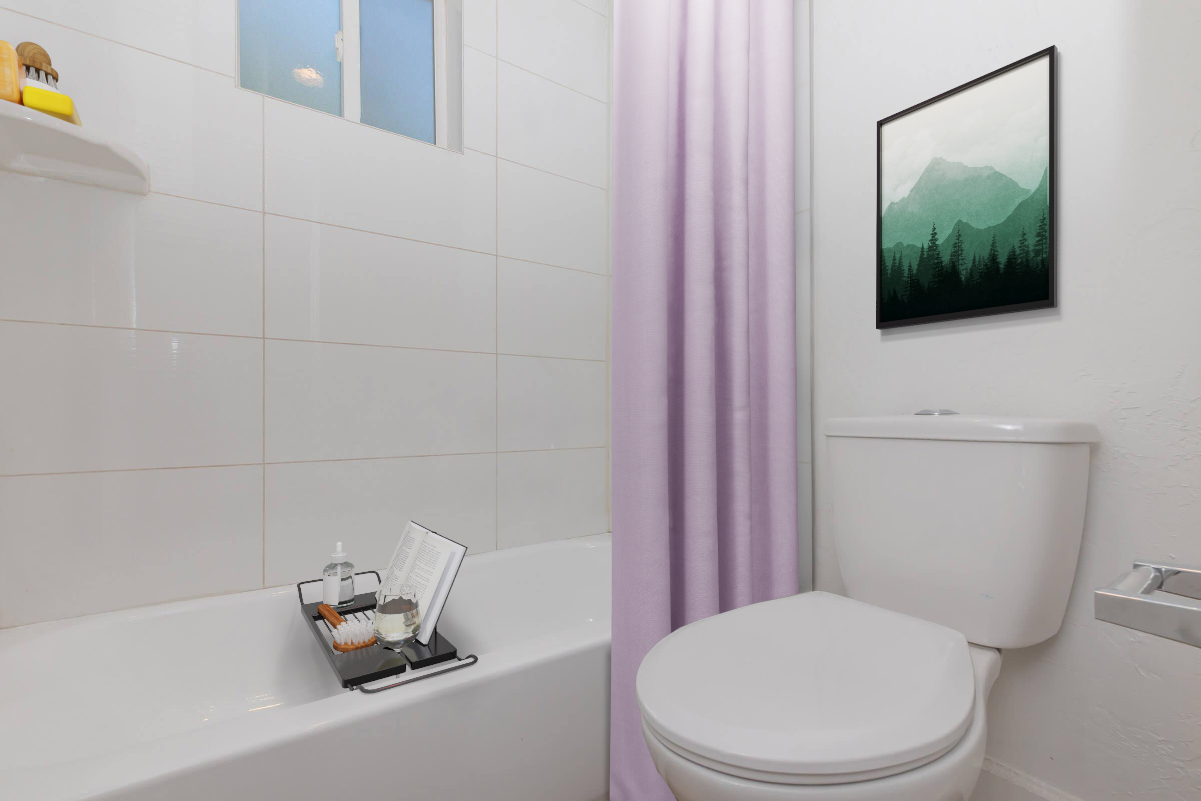 A neatly organized bathroom featuring a white toilet and a bathtub with a lavender shower curtain. A small tray on the tub holds toiletries, and a framed landscape artwork hangs on the wall, depicting mountains and trees. Natural light enters through a window, brightening the space.