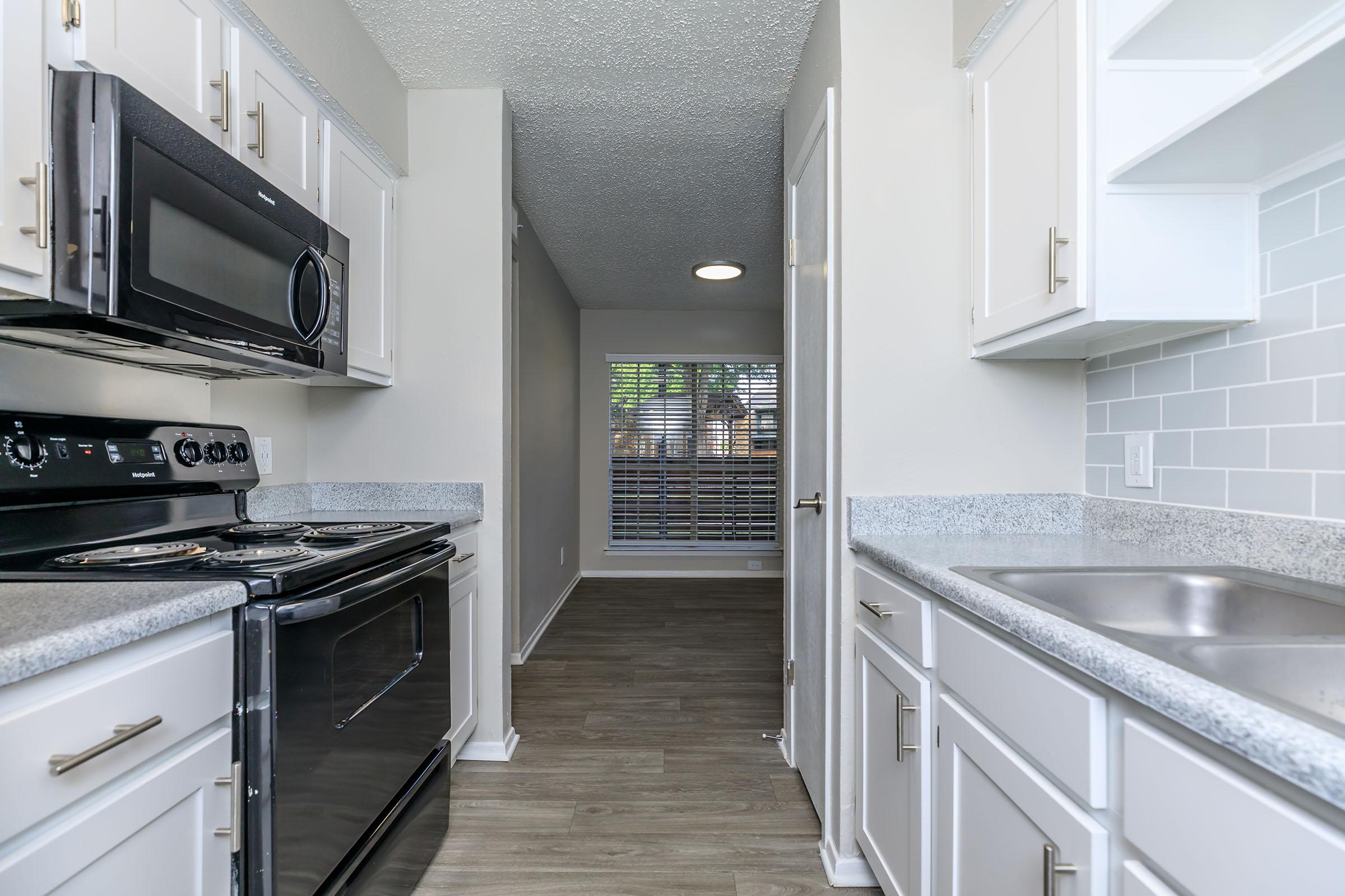 kitchen with black appliances 