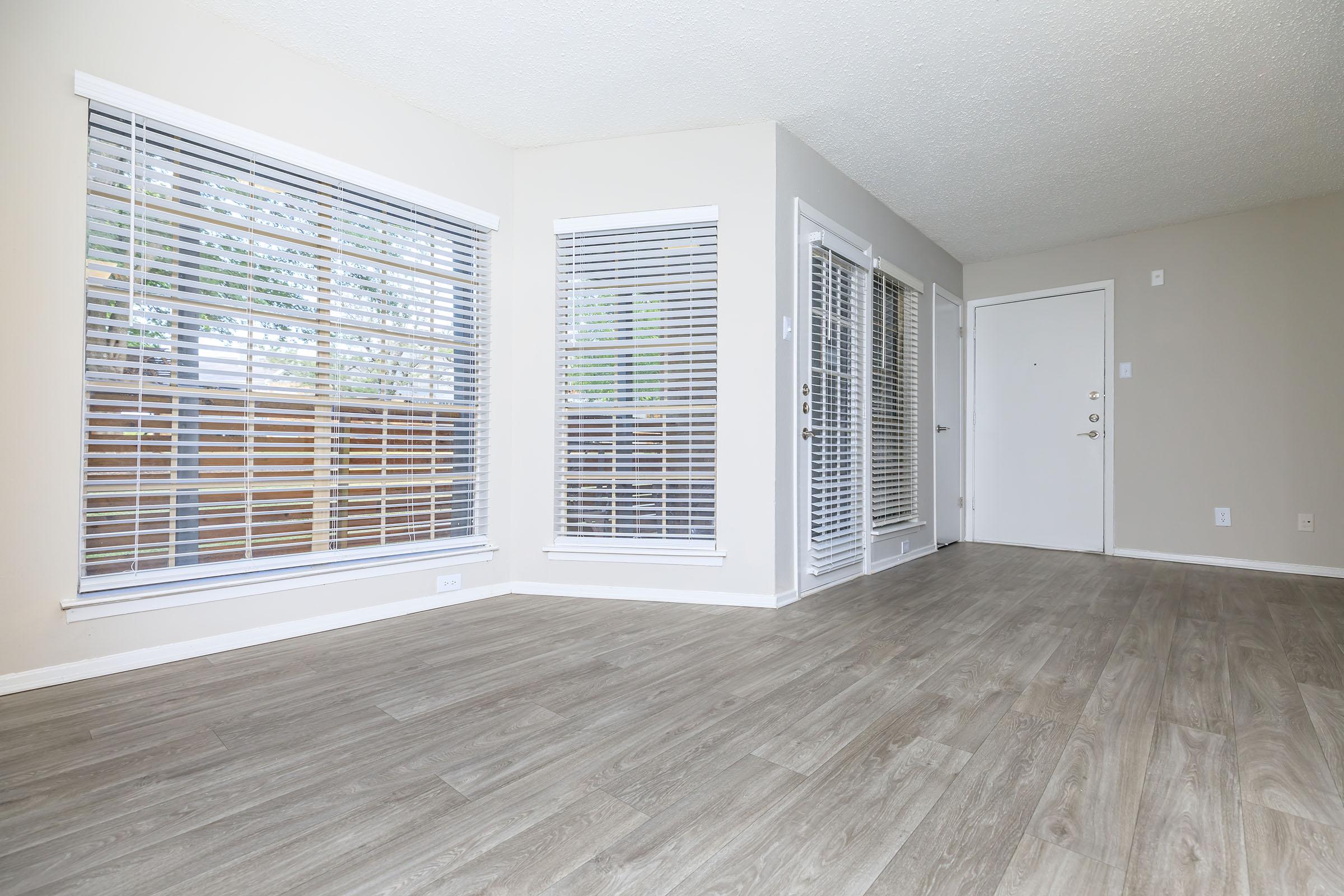 dining room with big paned windows