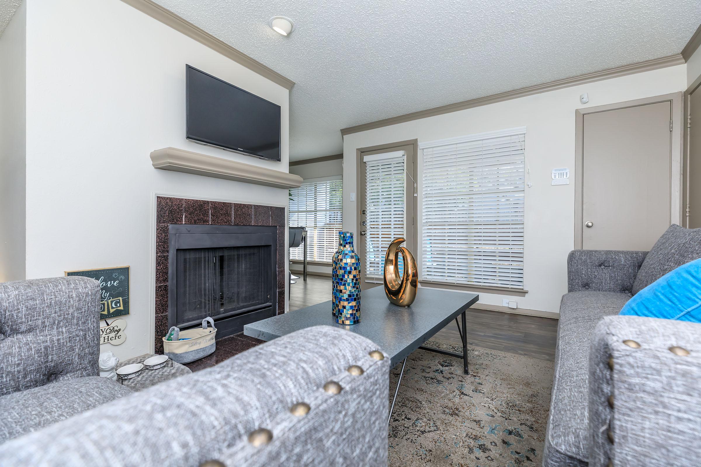 furnished living room with a fireplace