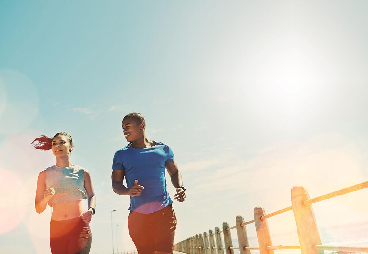 a man and woman running