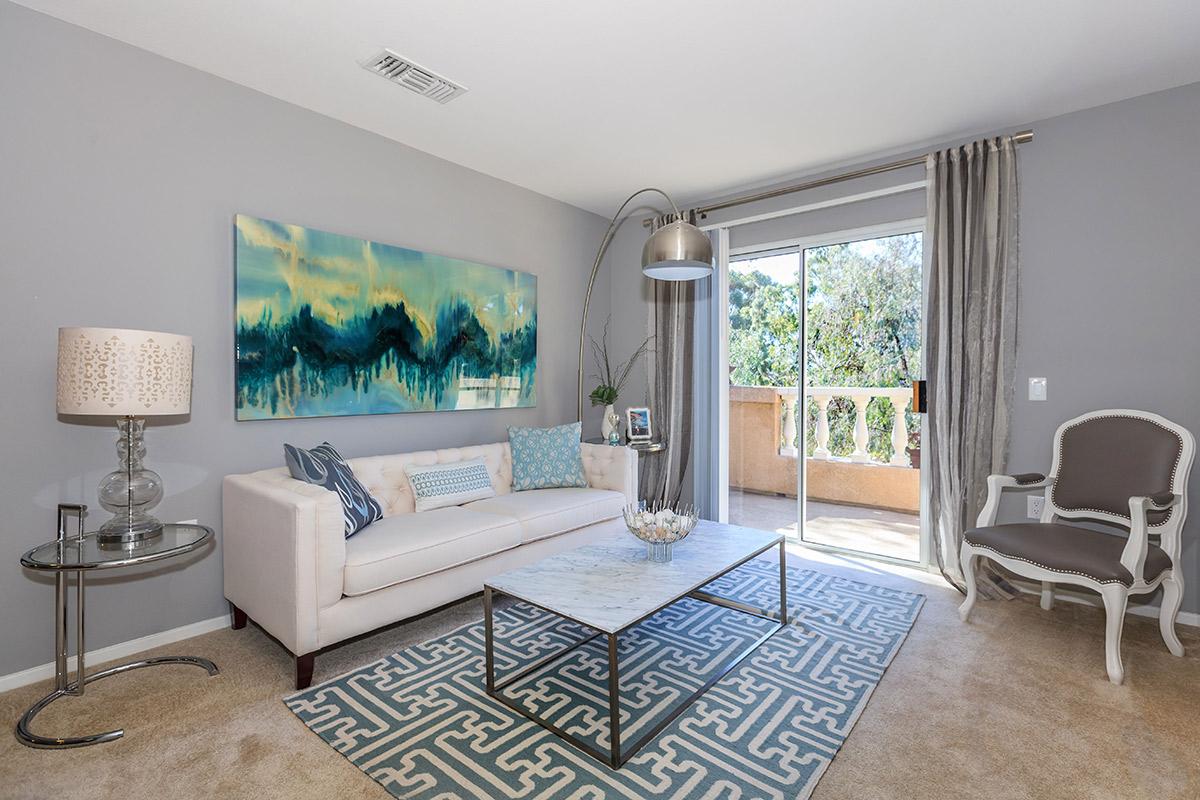 a living room filled with furniture