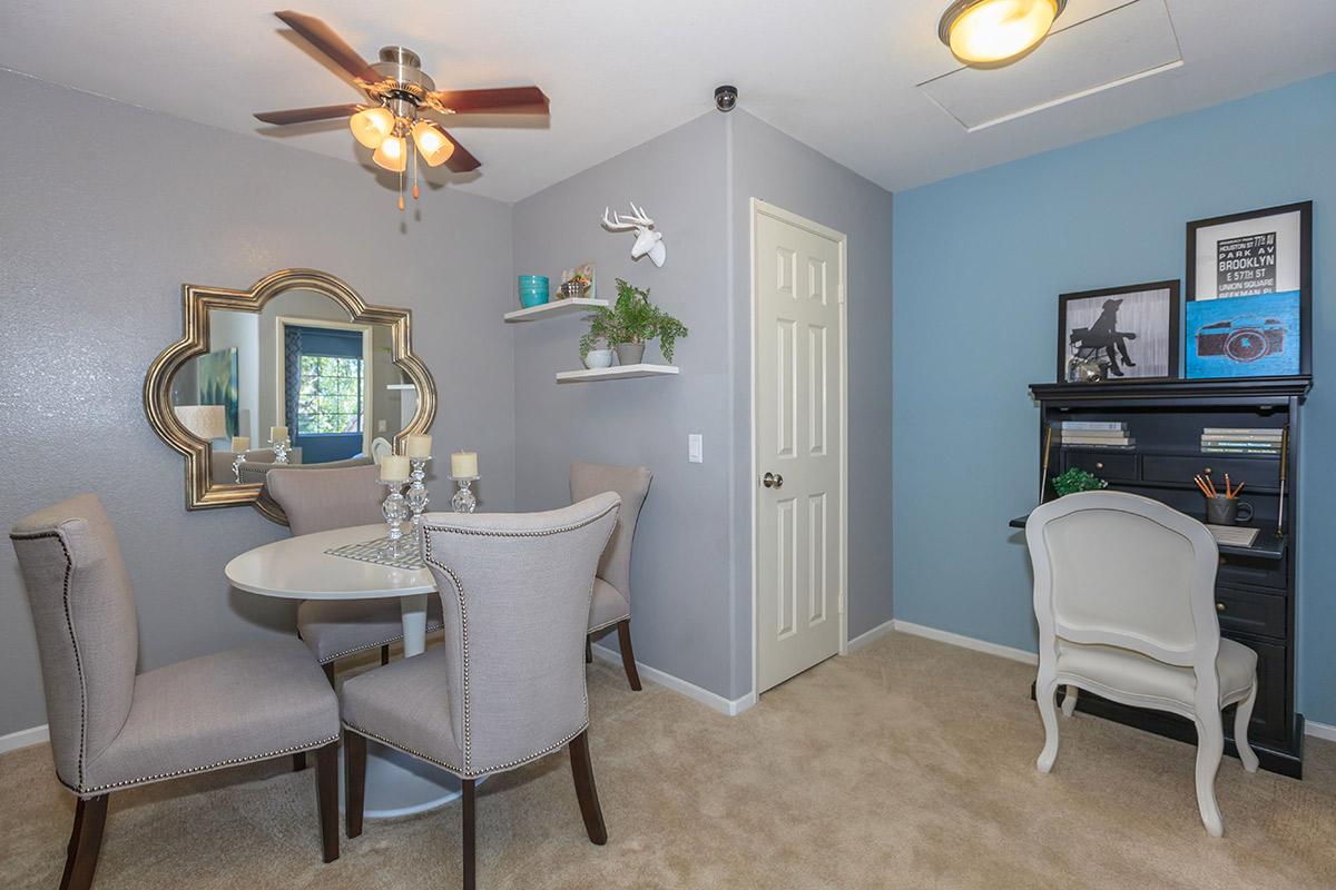 a dining room with carpet