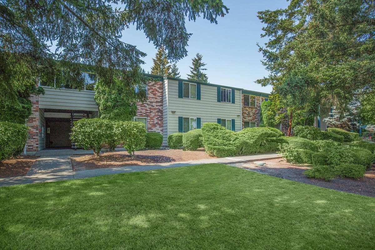 a large lawn in front of a house