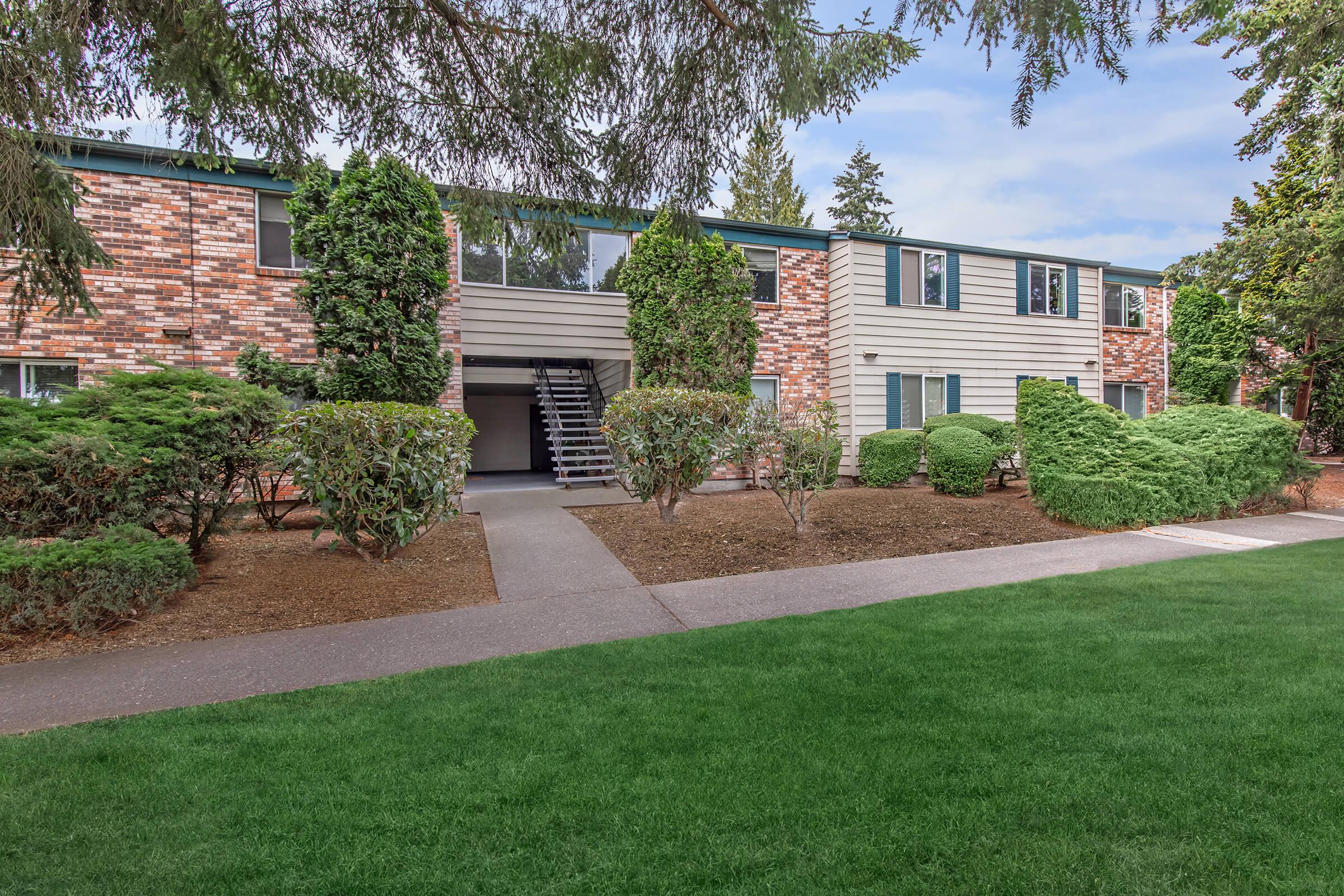 a large lawn in front of a house