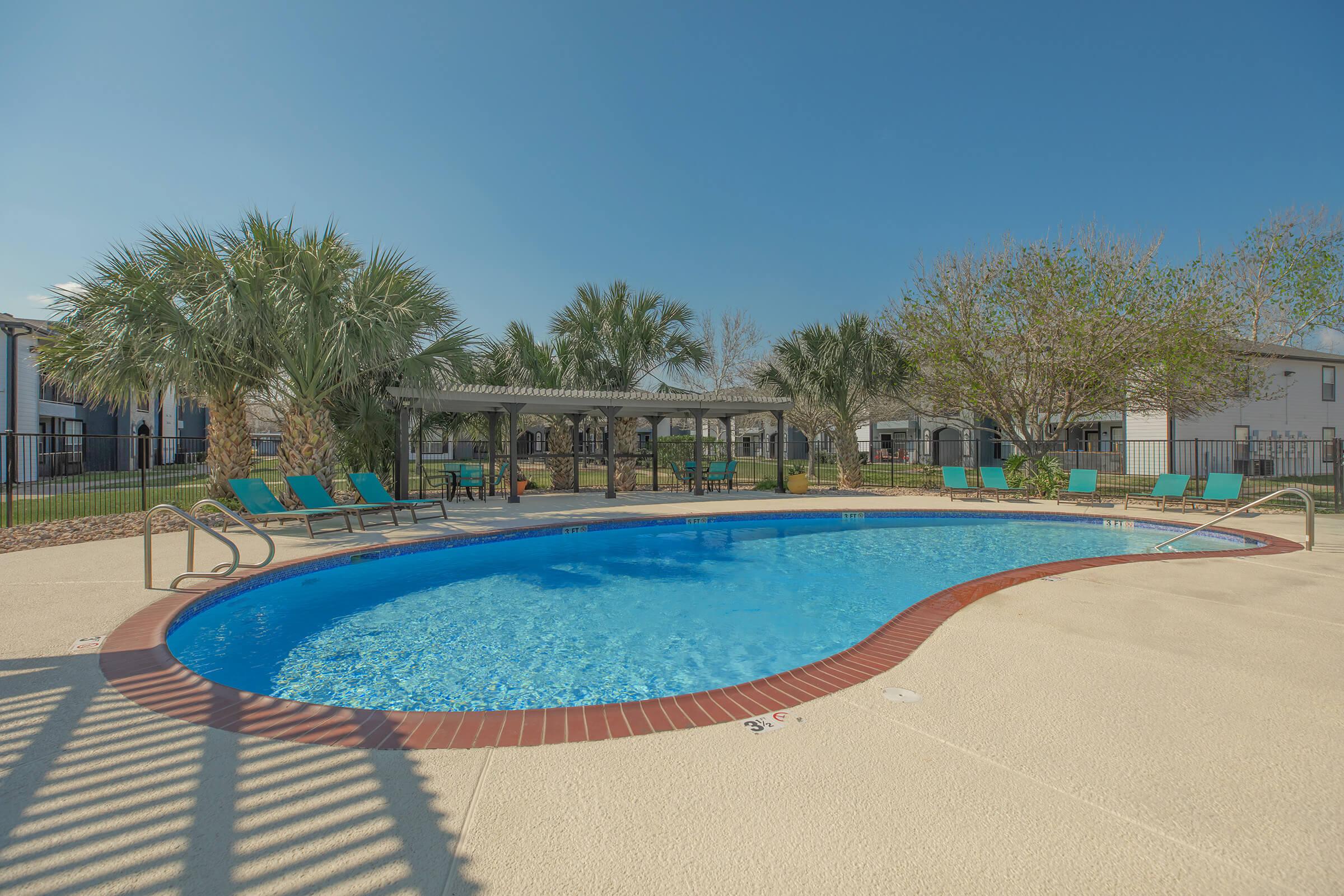 RELAX BESIDE OUR SPARKLING SWIMMING POOL