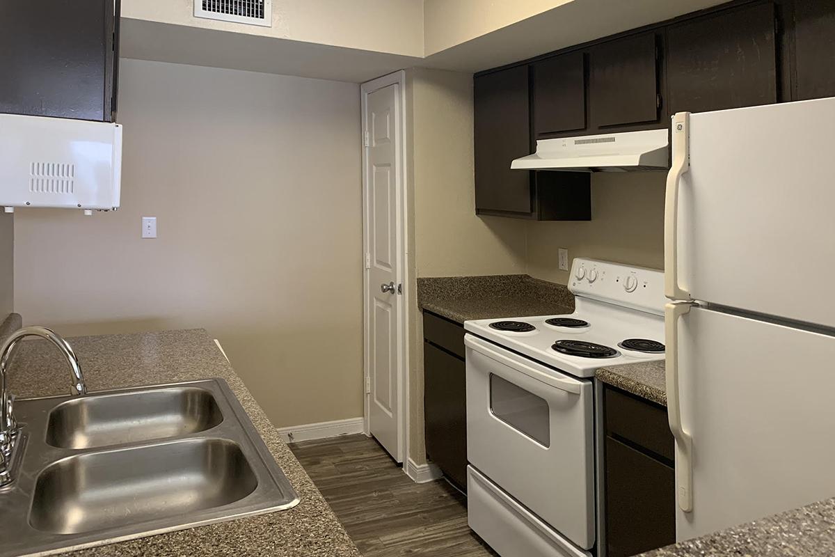 a stainless steel refrigerator in a kitchen