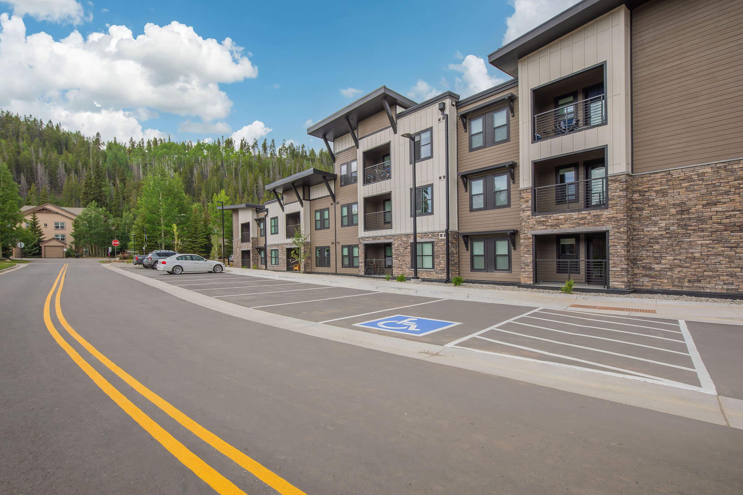 a road with a building in the background