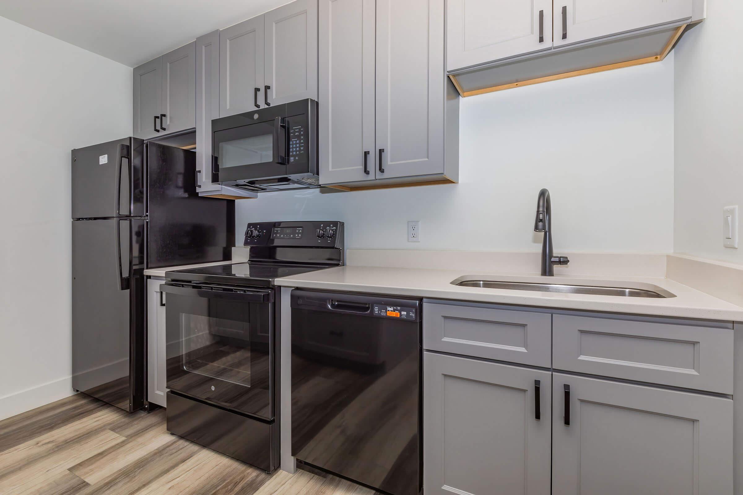 a kitchen with stainless steel appliances