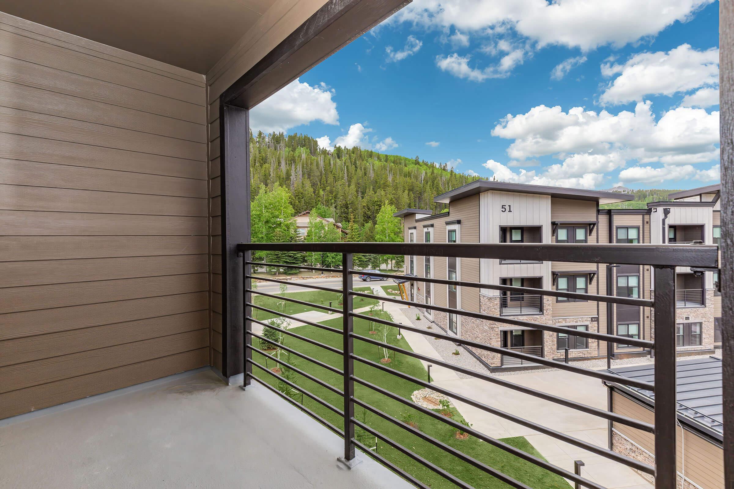 a building with a wooden fence