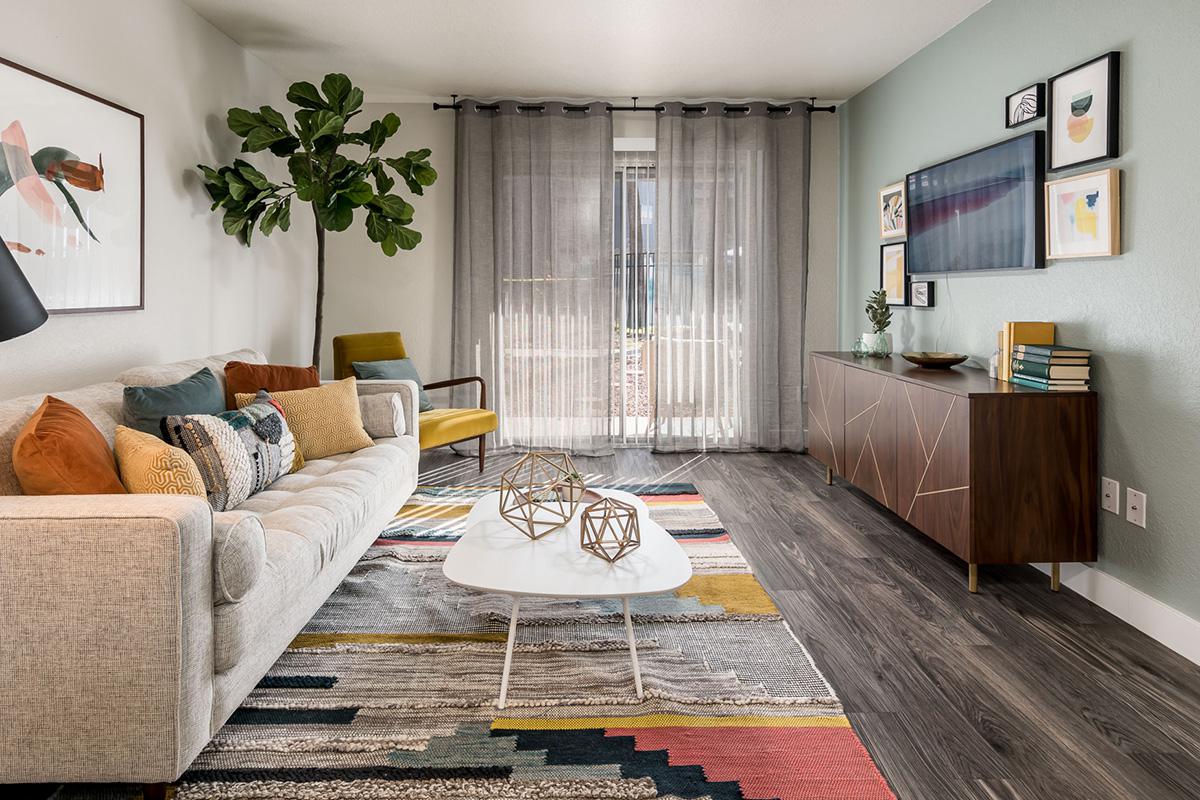 Updated Living room with Wood-Style flooring - Elevate Apartments - Tucson - Arizona