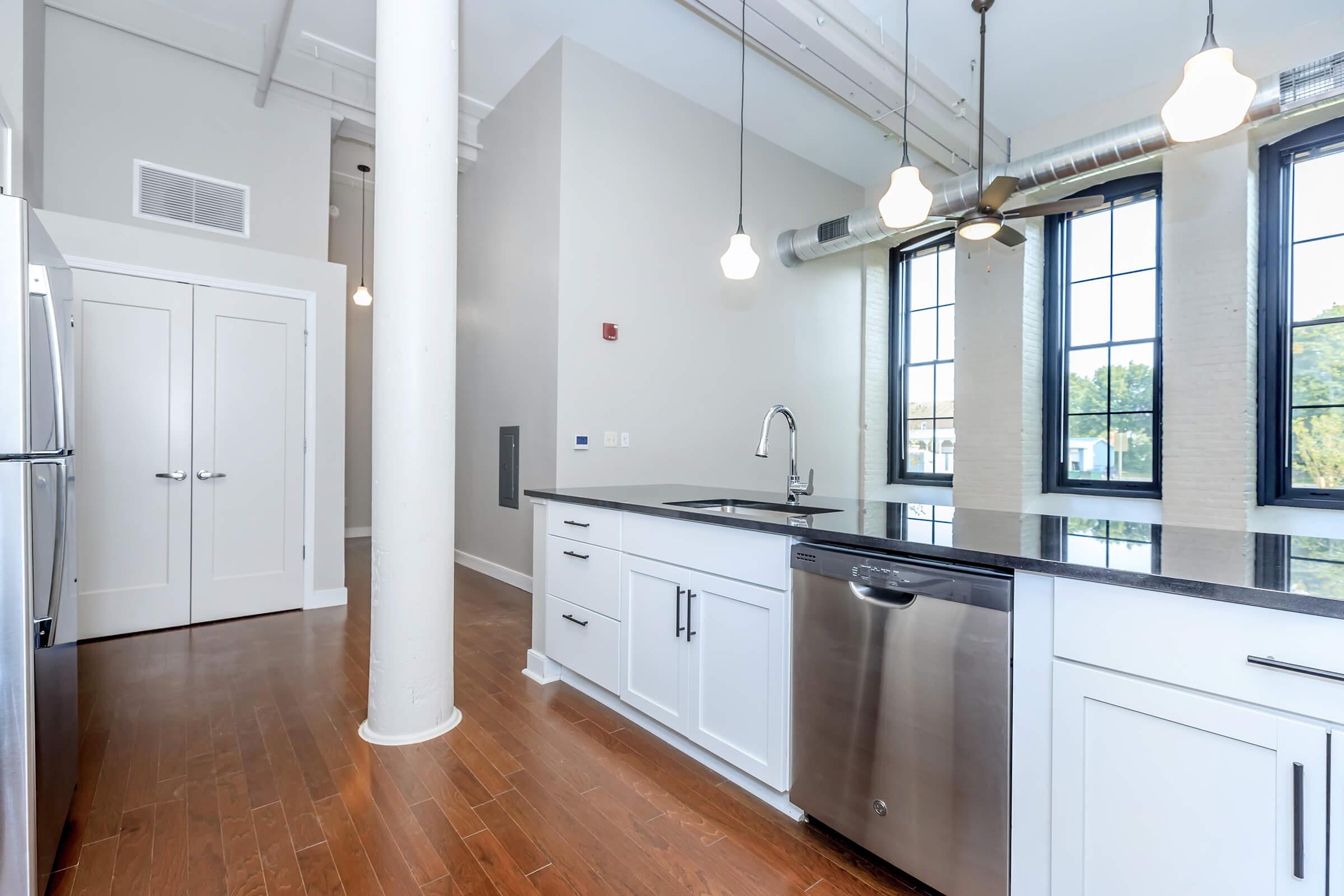 a kitchen with a large window